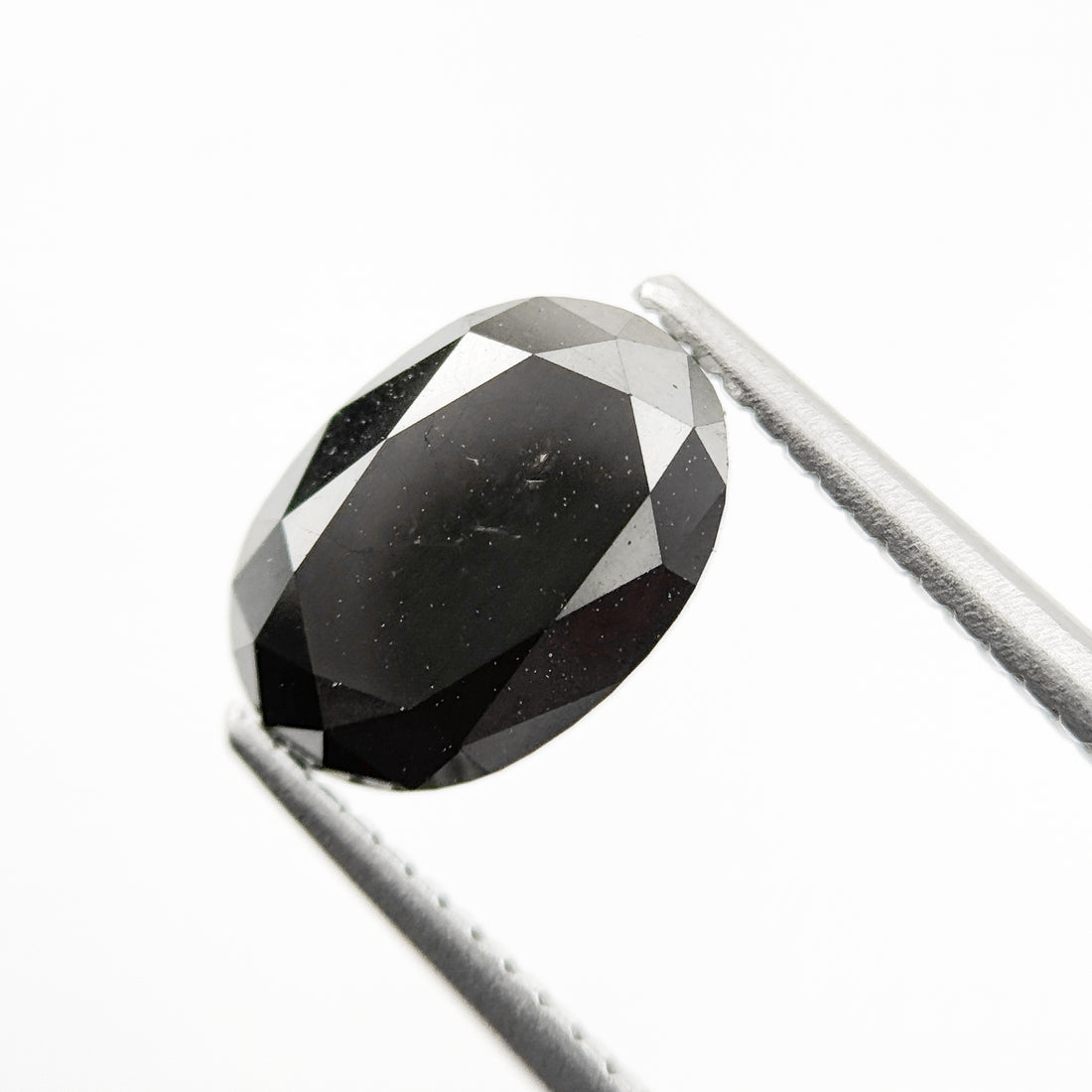 9.9 MM Oval Brilliant Cut Black Natural Fancy Diamond