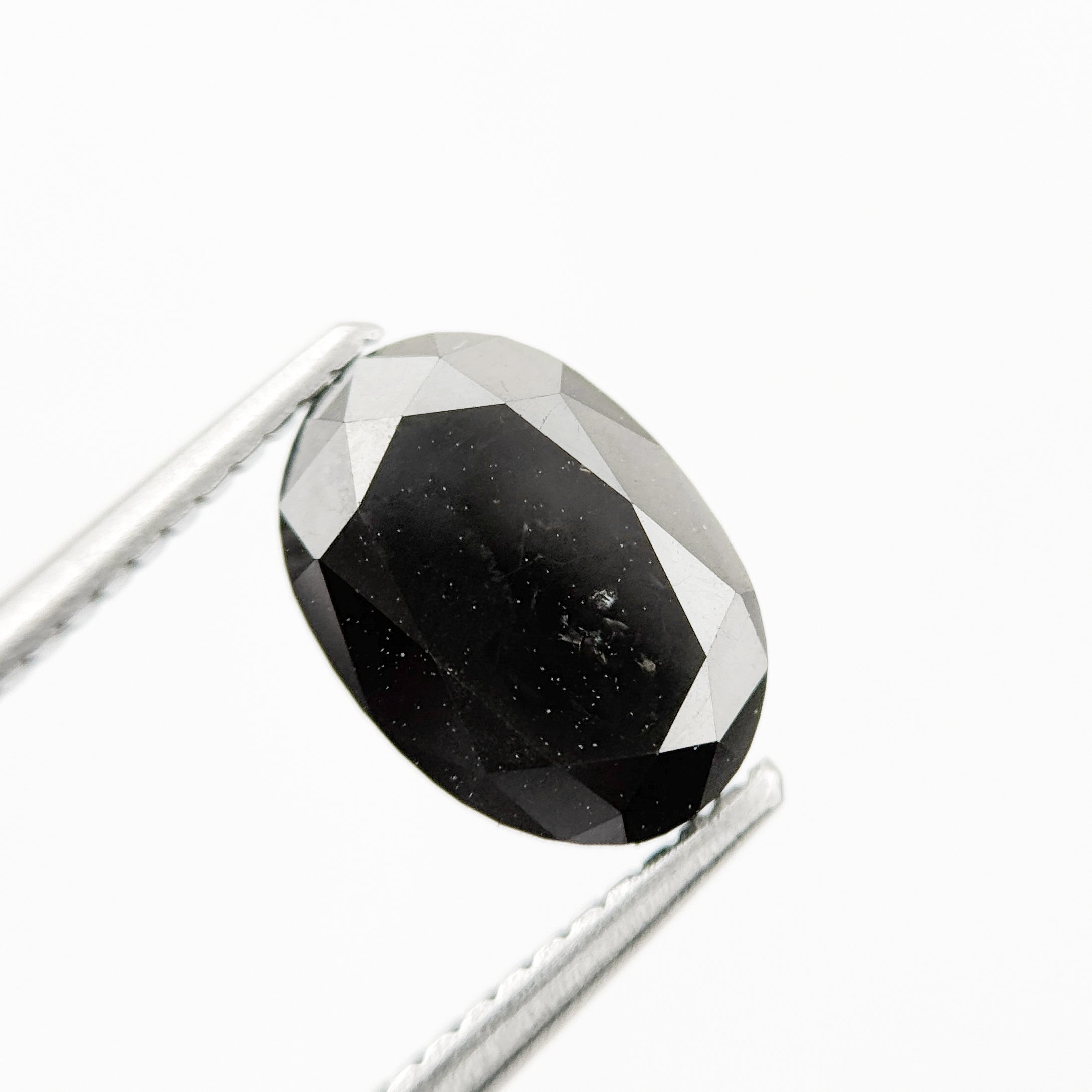 9.9 MM Oval Brilliant Cut Black Natural Fancy Diamond