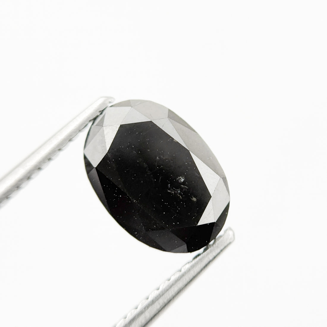 9.9 MM Oval Brilliant Cut Black Natural Fancy Diamond