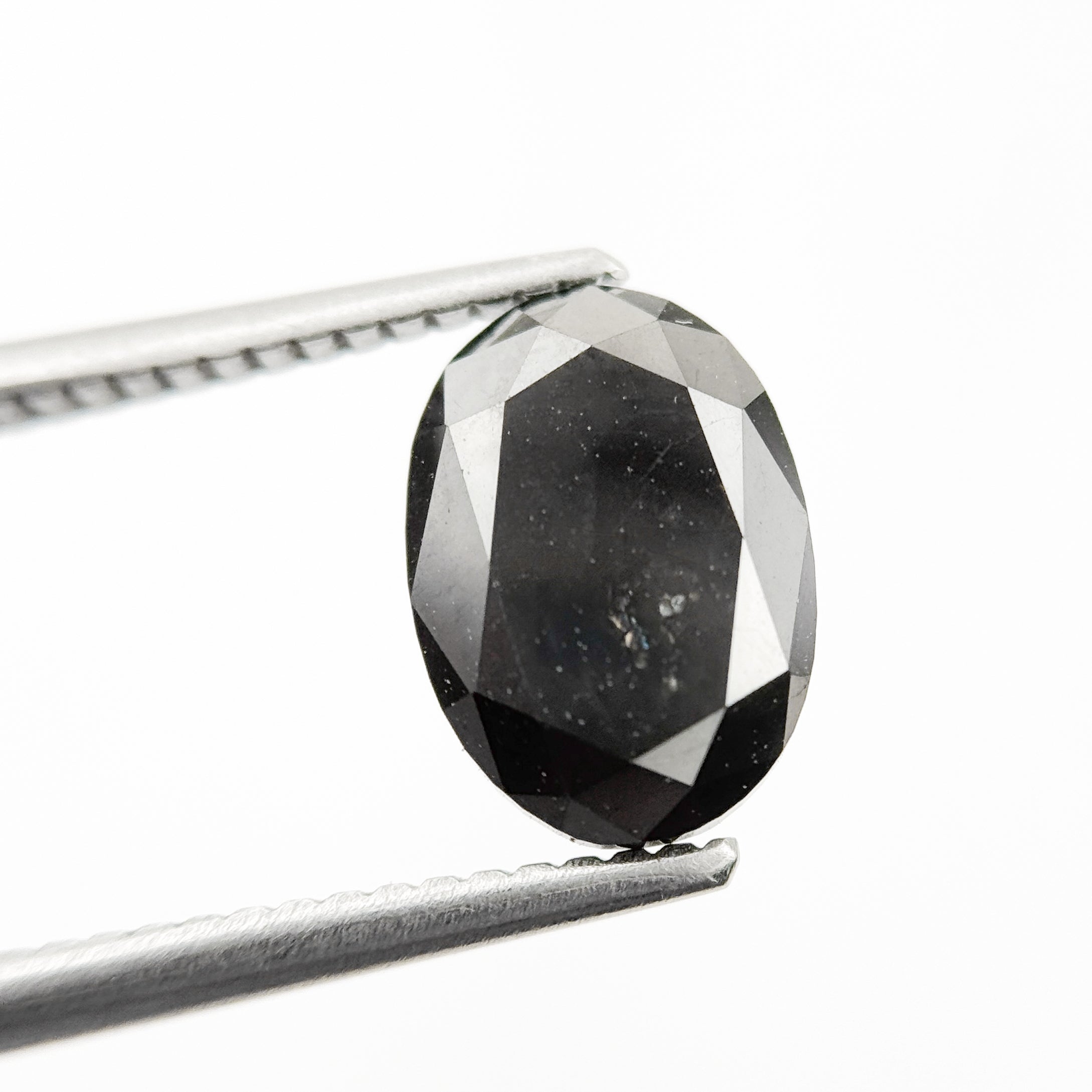9.9 MM Oval Brilliant Cut Black Natural Fancy Diamond