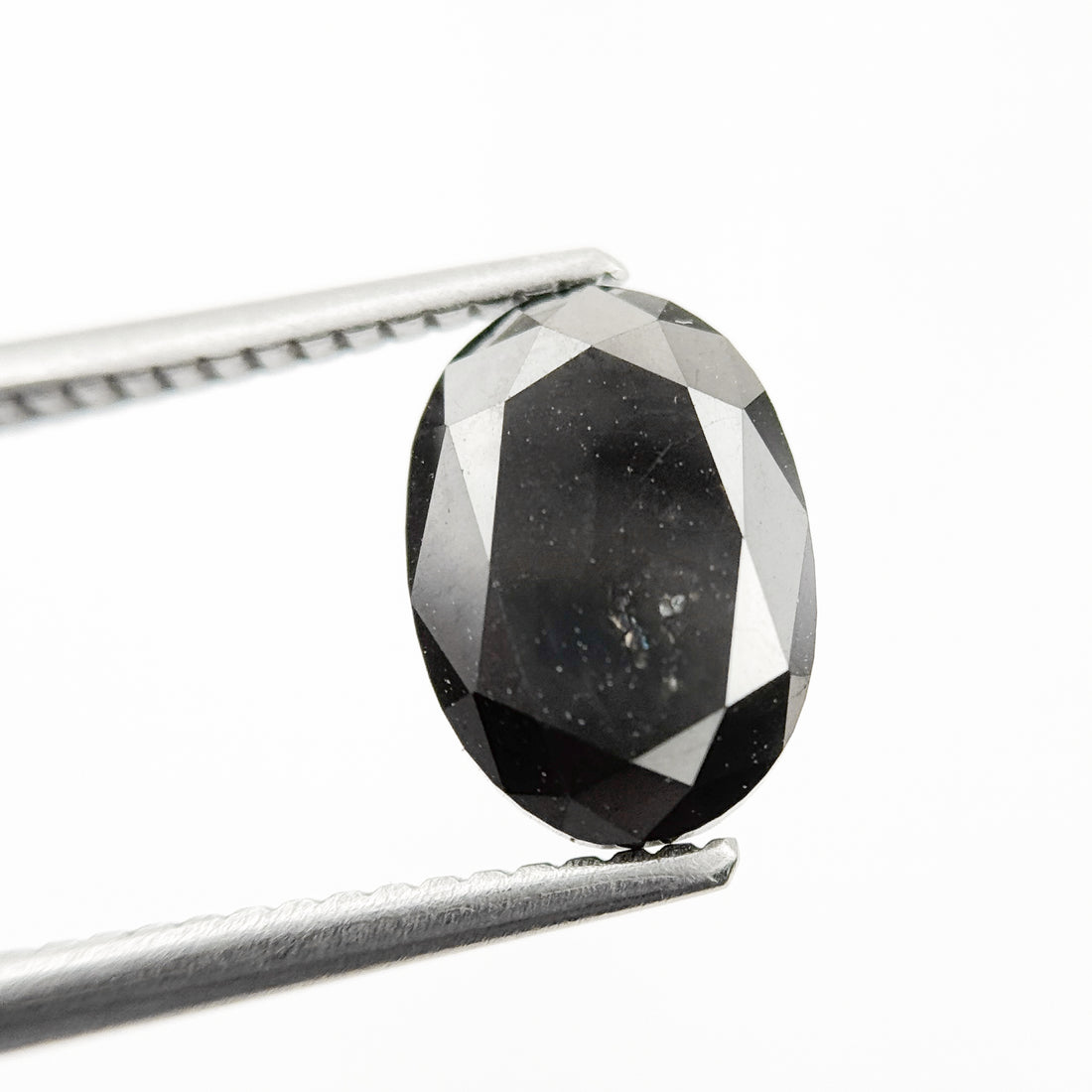 9.9 MM Oval Brilliant Cut Black Natural Fancy Diamond