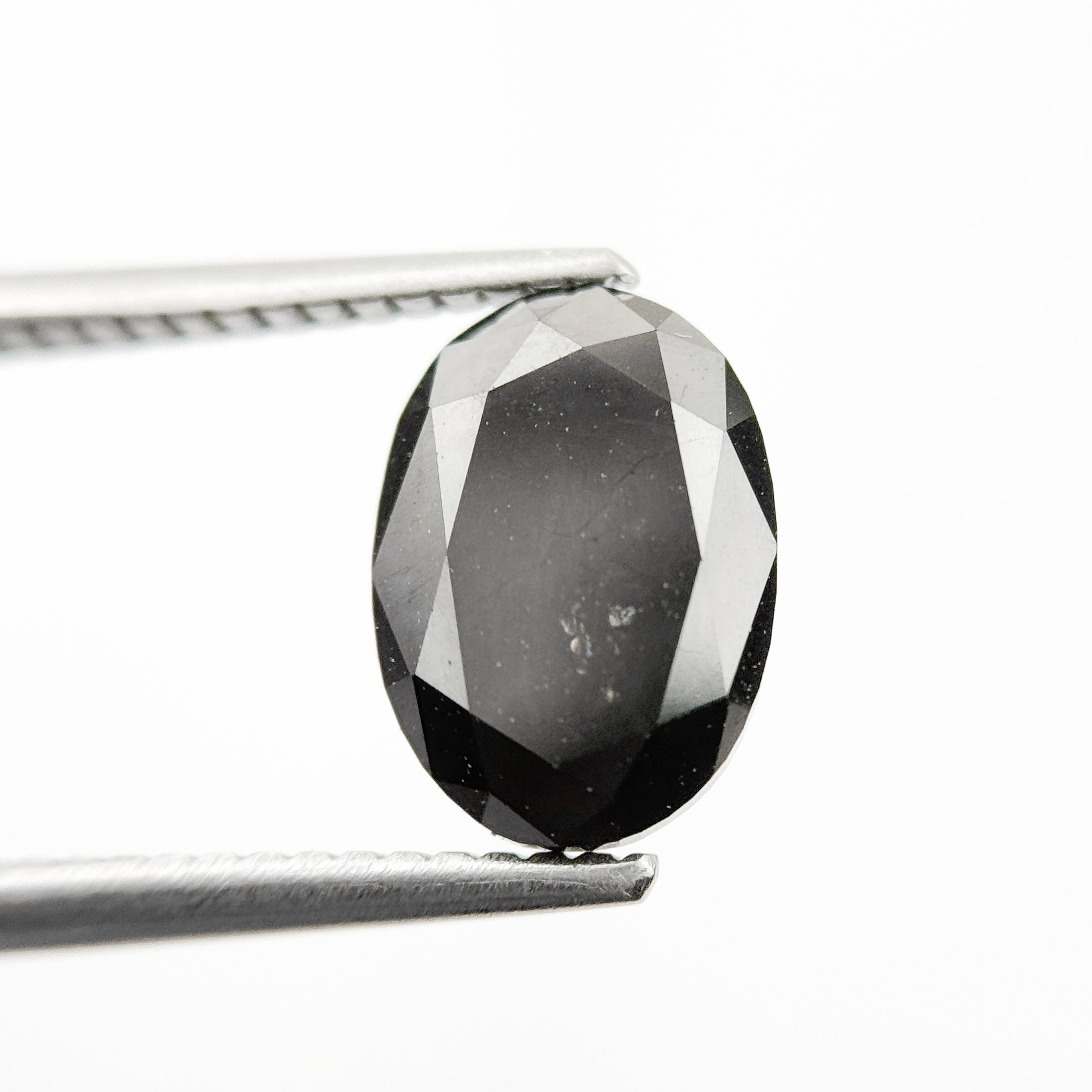 9.9 MM Oval Brilliant Cut Black Natural Fancy Diamond