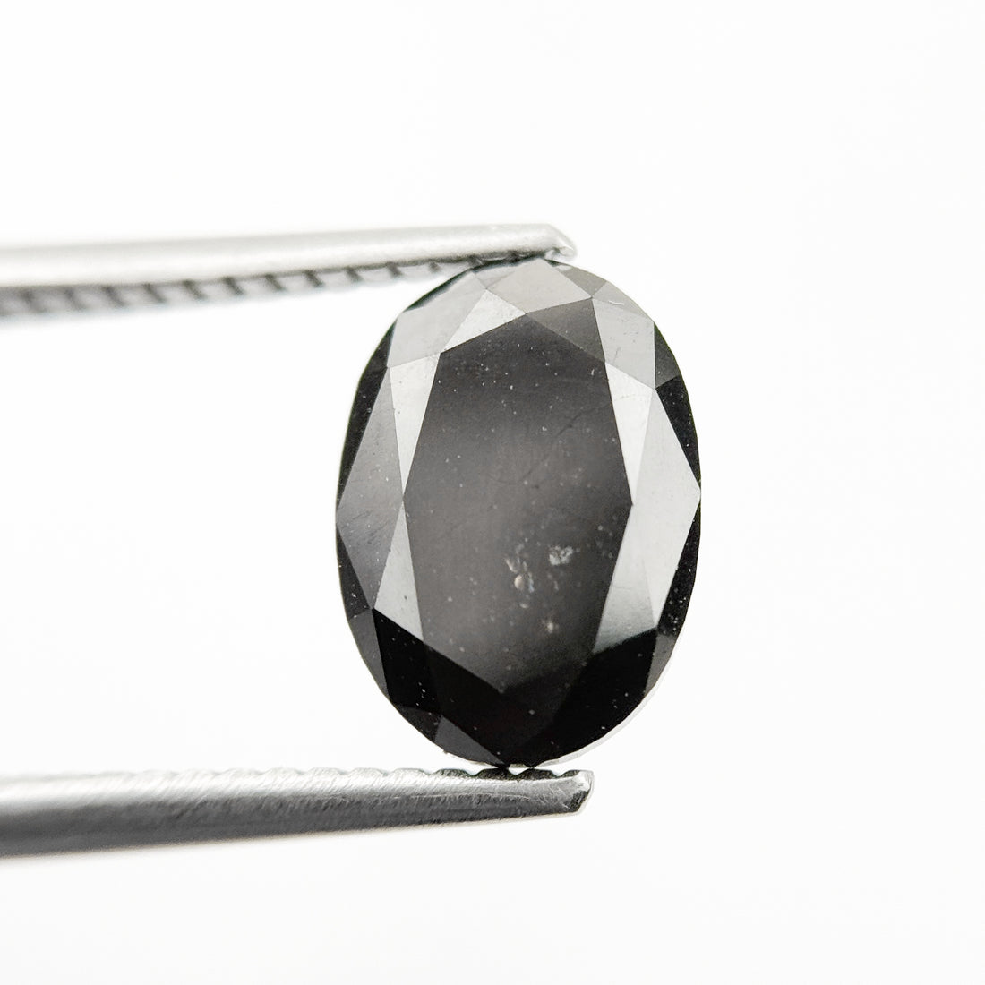 9.9 MM Oval Brilliant Cut Black Natural Fancy Diamond