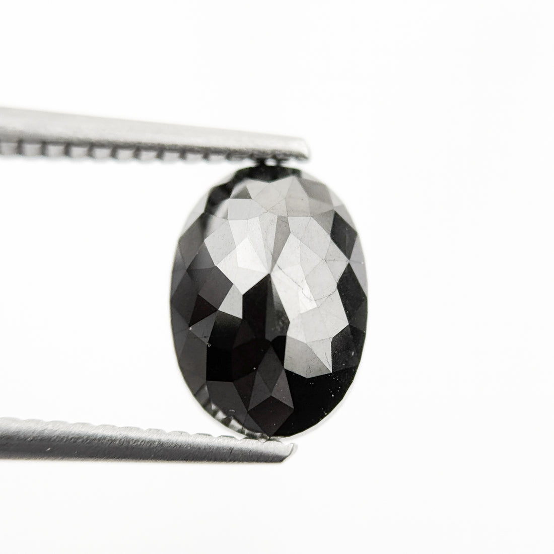 9.9 MM Oval Brilliant Cut Black Natural Fancy Diamond