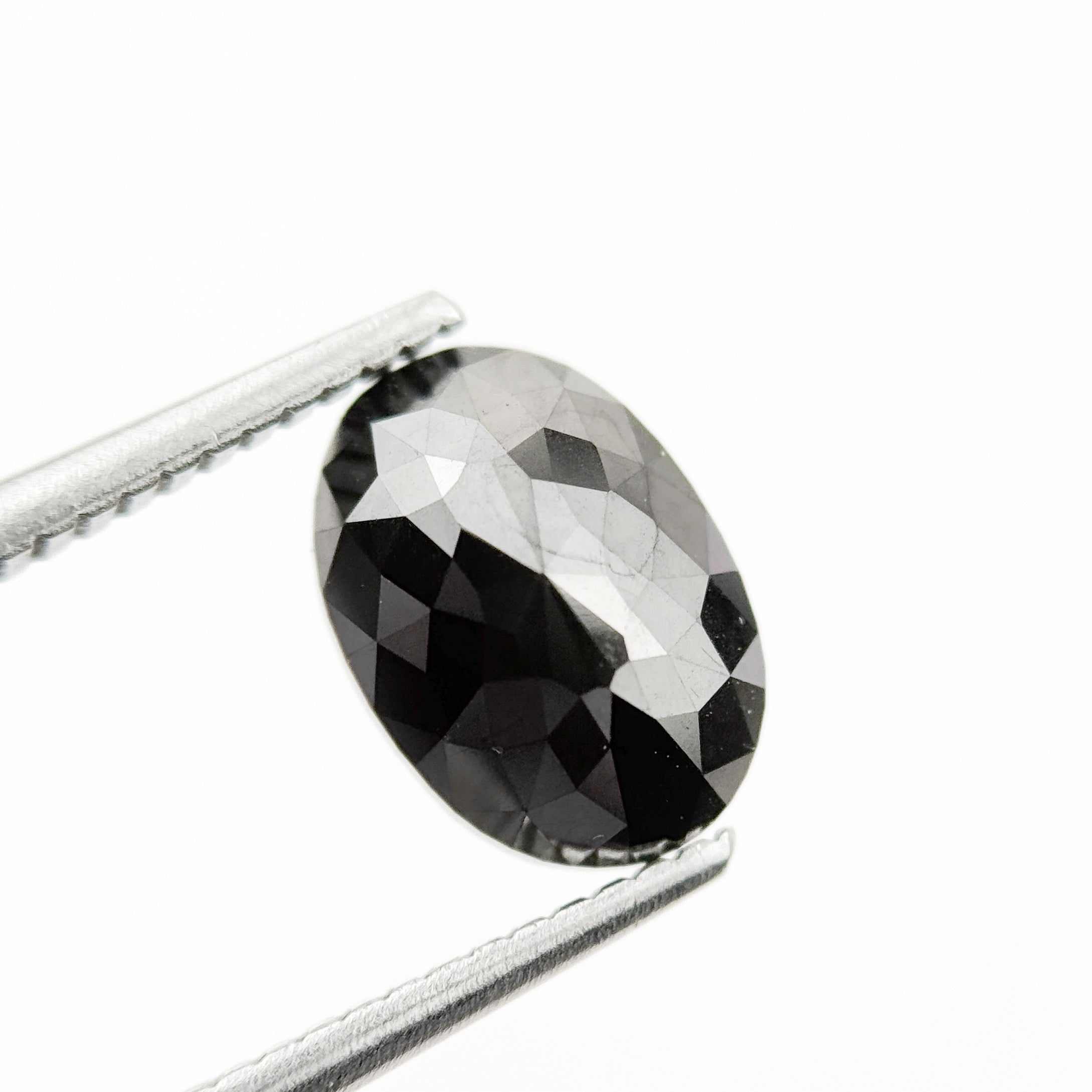 9.9 MM Oval Brilliant Cut Black Natural Fancy Diamond