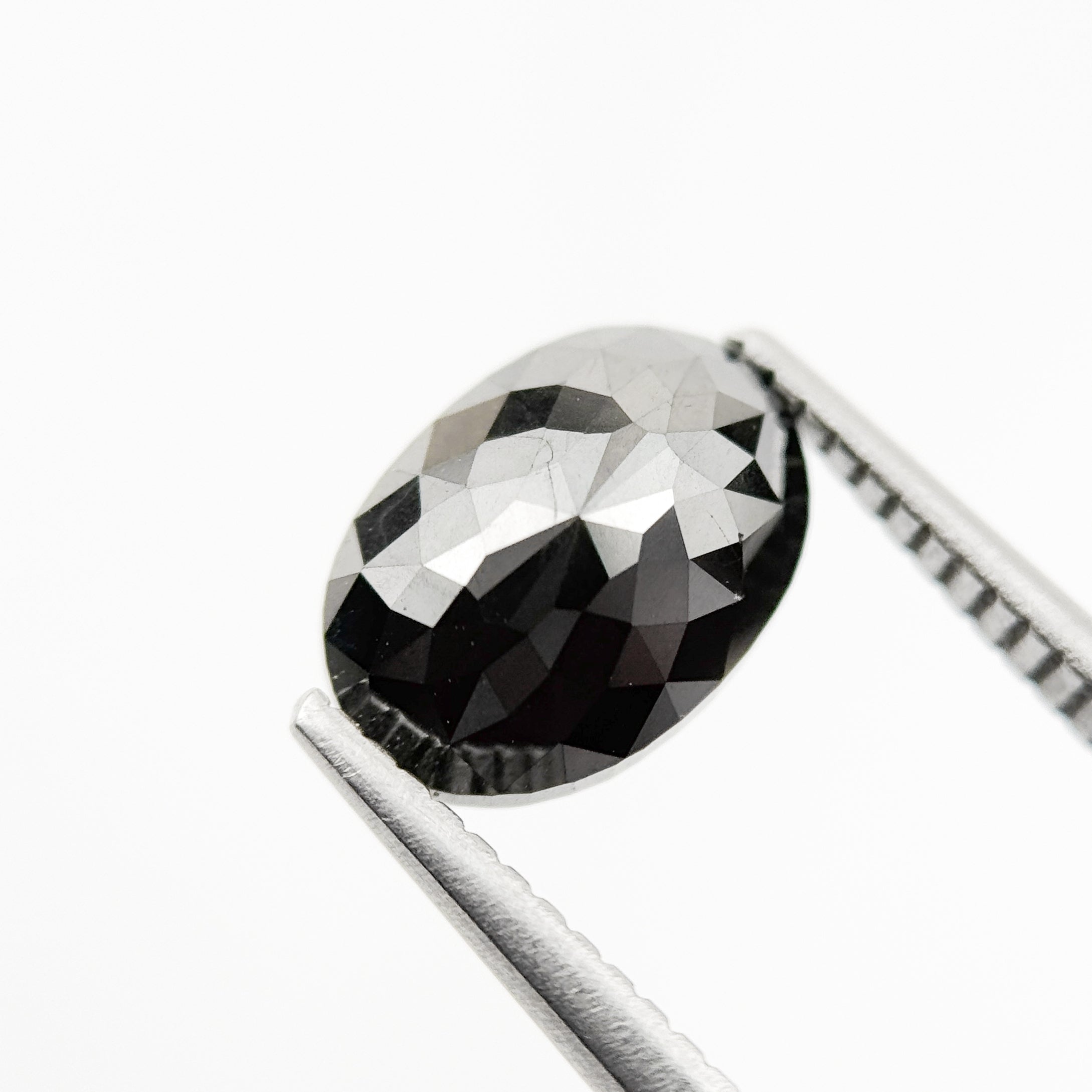 9.9 MM Oval Brilliant Cut Black Natural Fancy Diamond