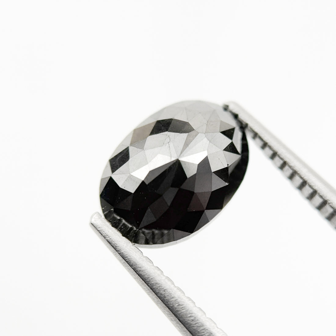 9.9 MM Oval Brilliant Cut Black Natural Fancy Diamond