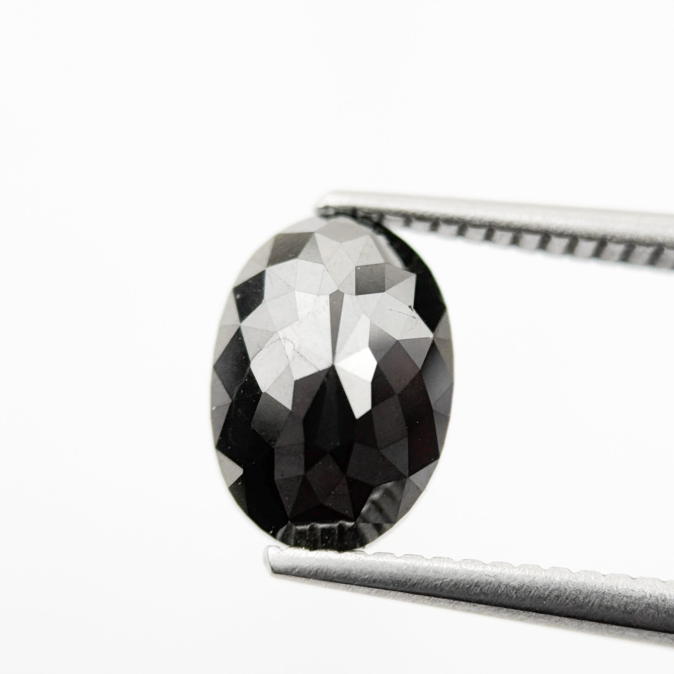 9.9 MM Oval Brilliant Cut Black Natural Fancy Diamond