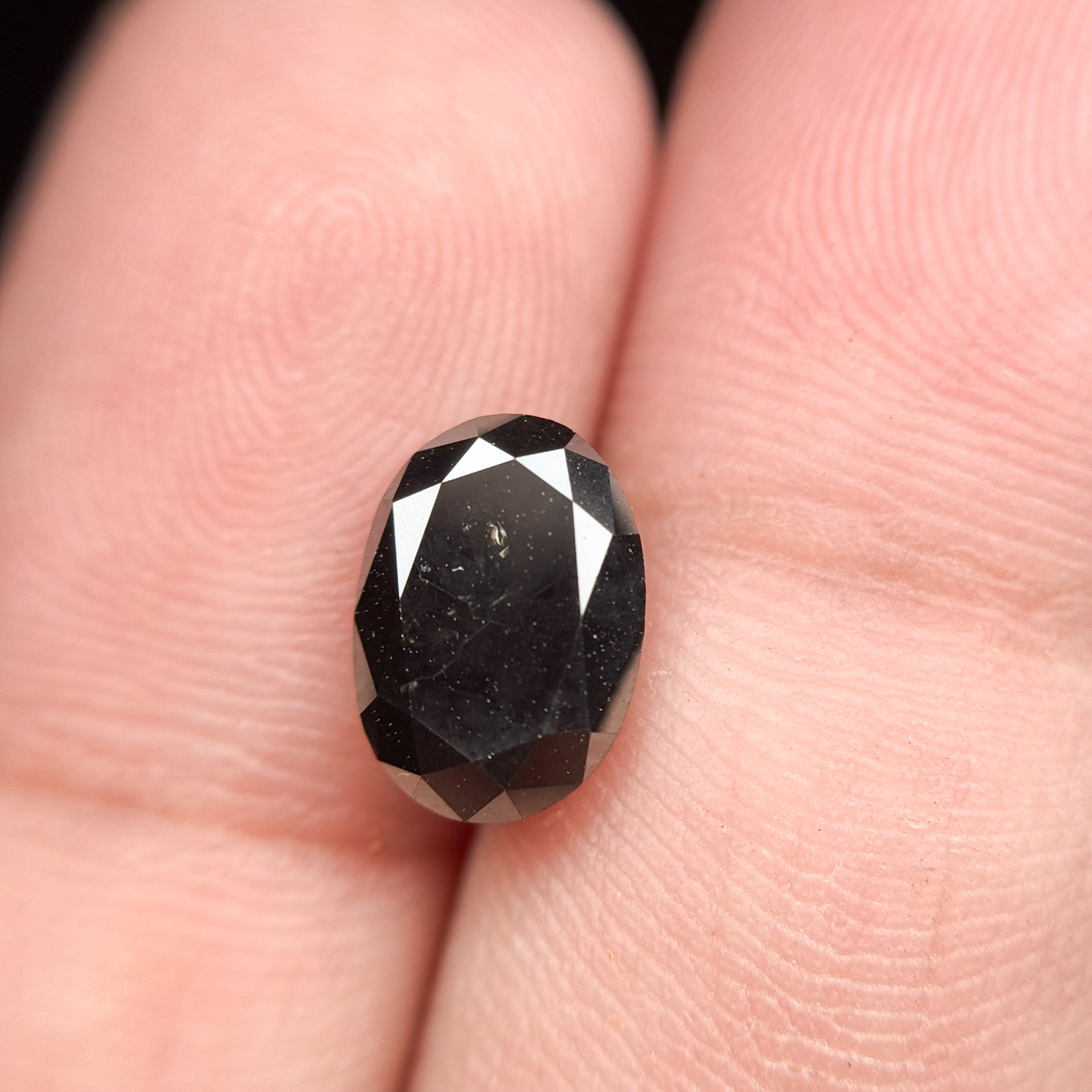9.9 MM Oval Brilliant Cut Black Natural Fancy Diamond