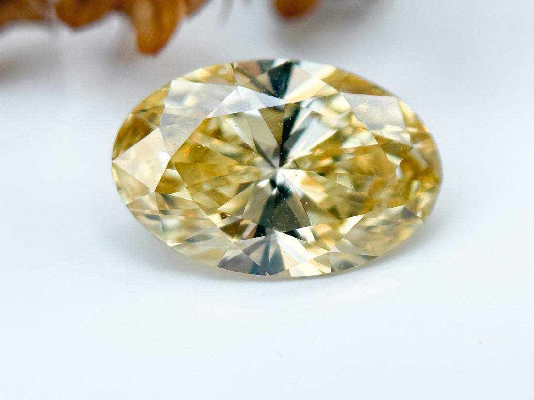 1.50 Ct Oval Brilliant Cut Yellow Natural Salt and Pepper Diamond