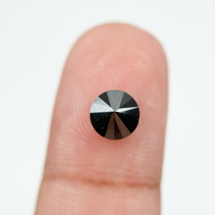 0.60 Ct Round Brilliant Cut Black Natural Salt and Pepper Diamond