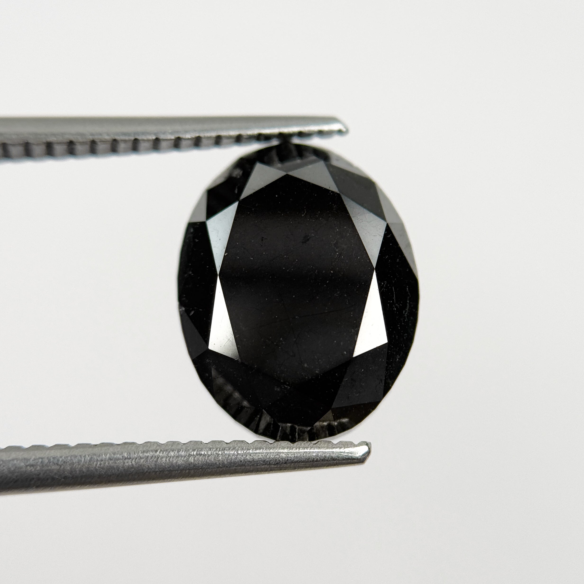 5.58 Ct Oval Brilliant Cut Black Natural Salt and Pepper Diamond