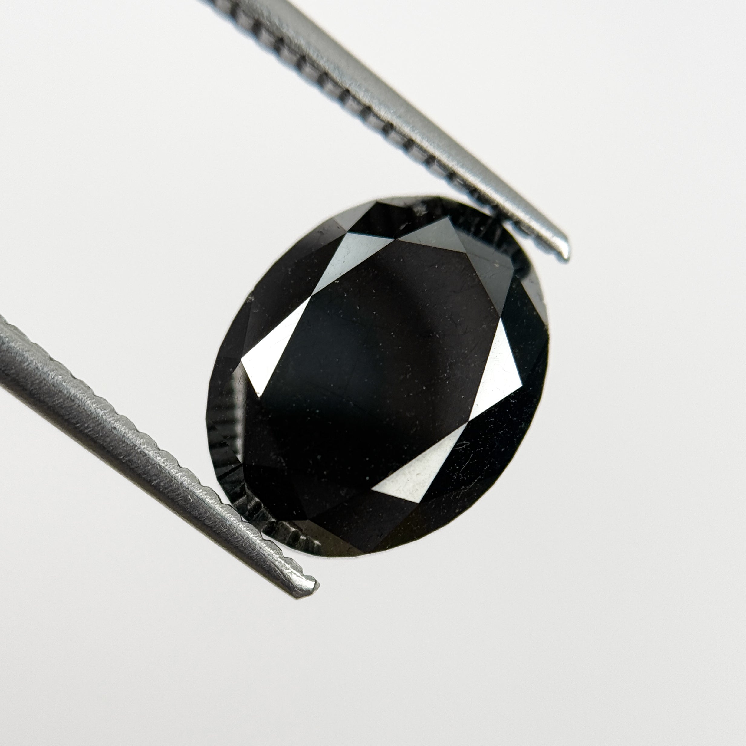 5.58 Ct Oval Brilliant Cut Black Natural Salt and Pepper Diamond