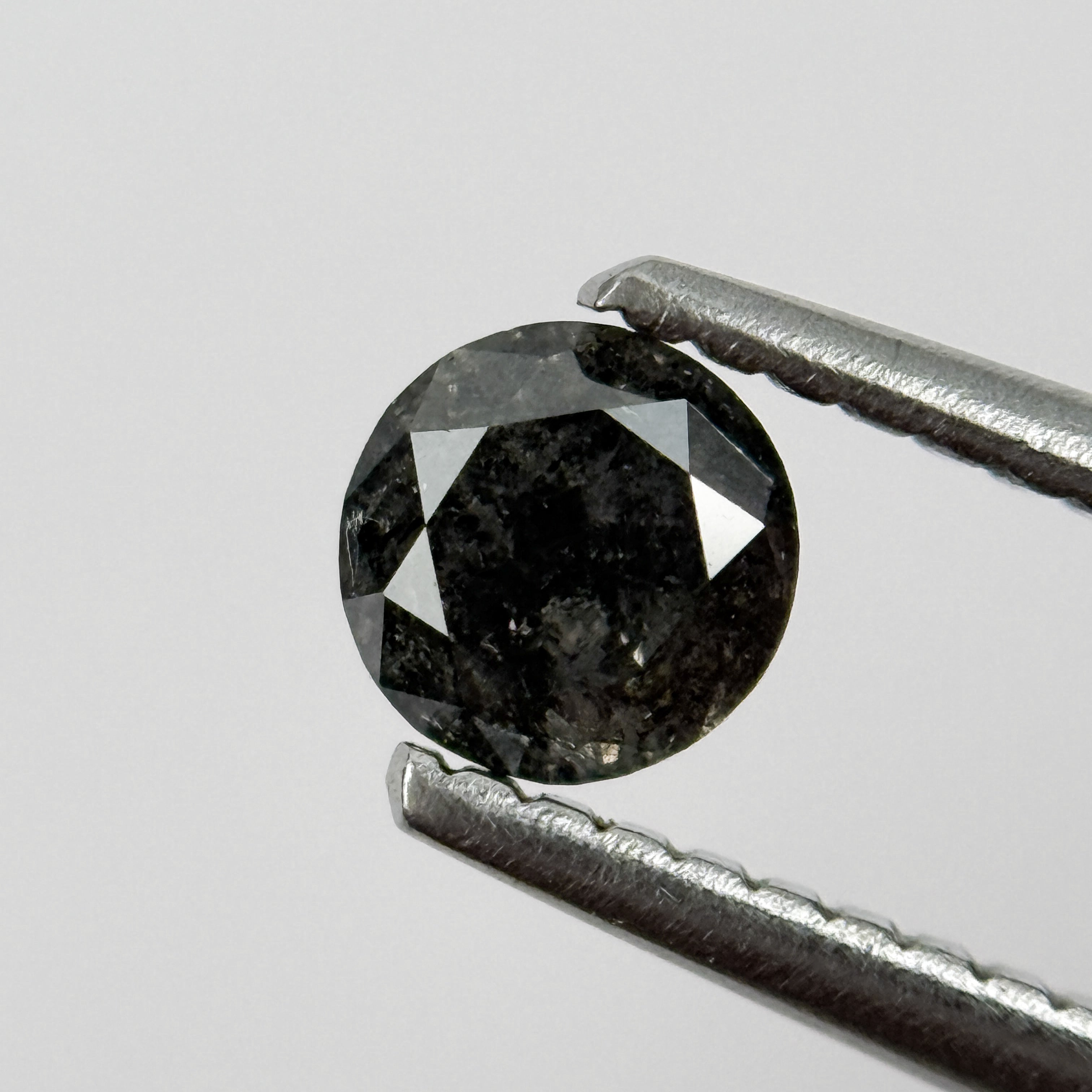 0.41 Ct Round Brilliant Cut Black Natural Salt and Pepper Diamond