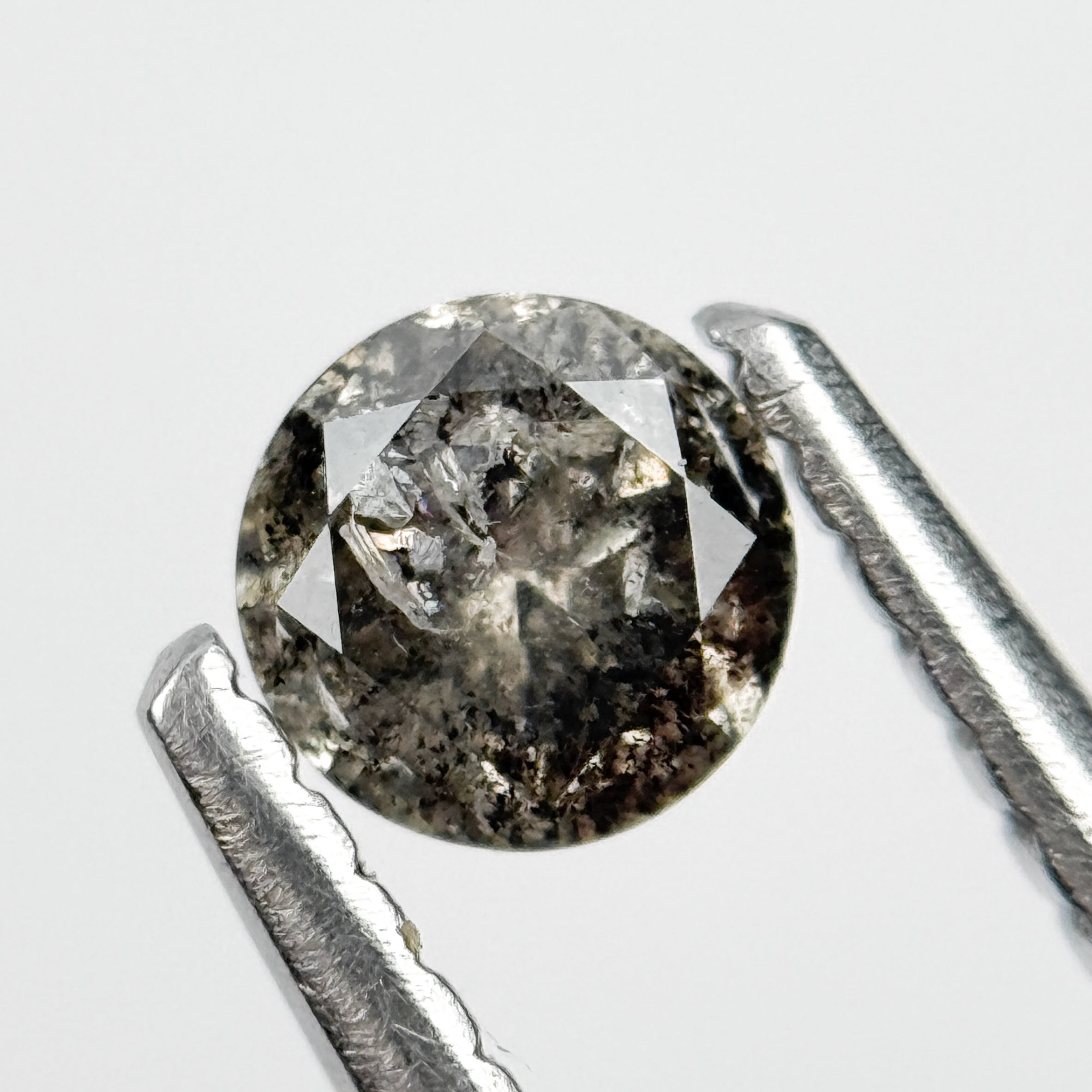 0.28 Ct Round Brilliant Cut Black Natural Salt and Pepper Diamond