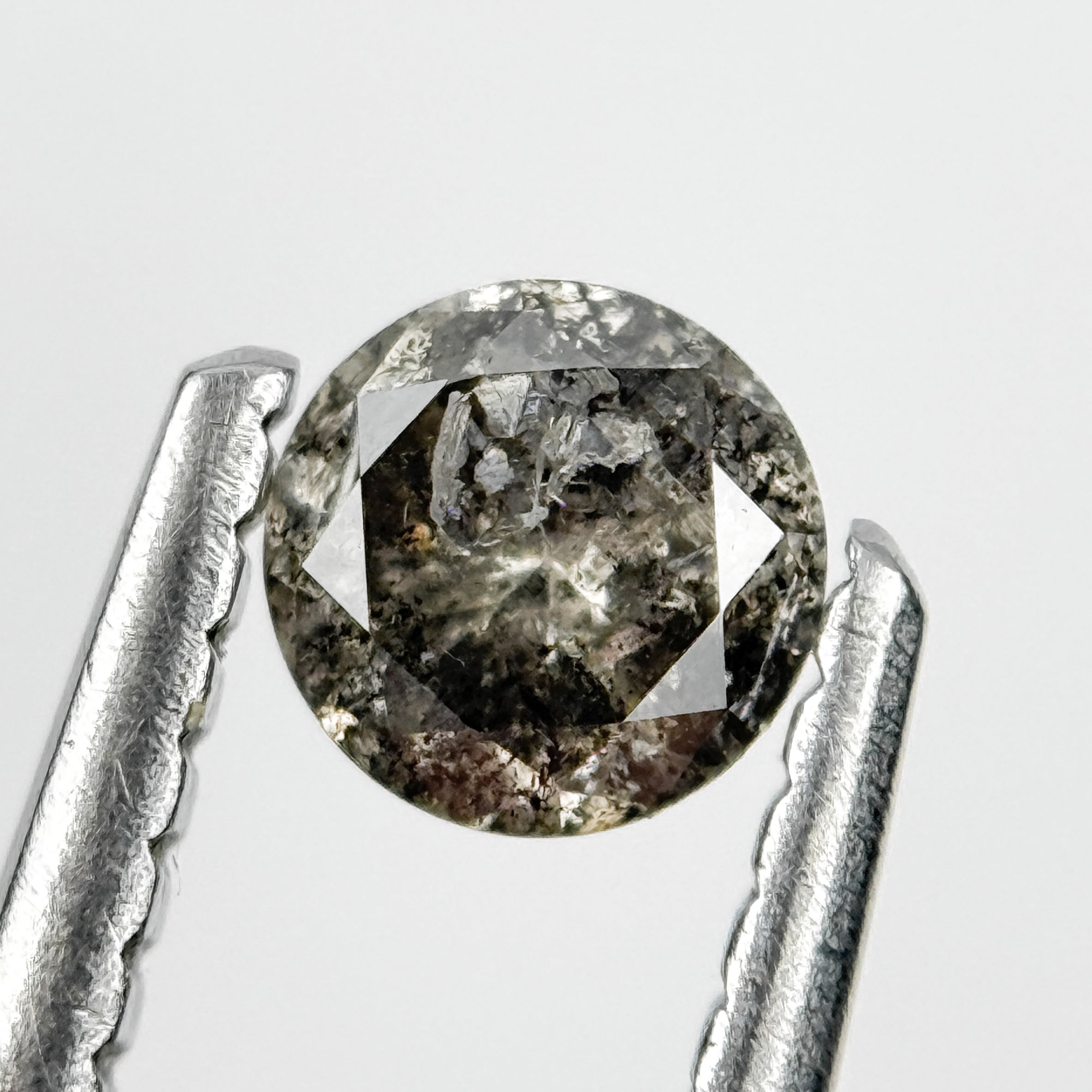 0.28 Ct Round Brilliant Cut Black Natural Salt and Pepper Diamond