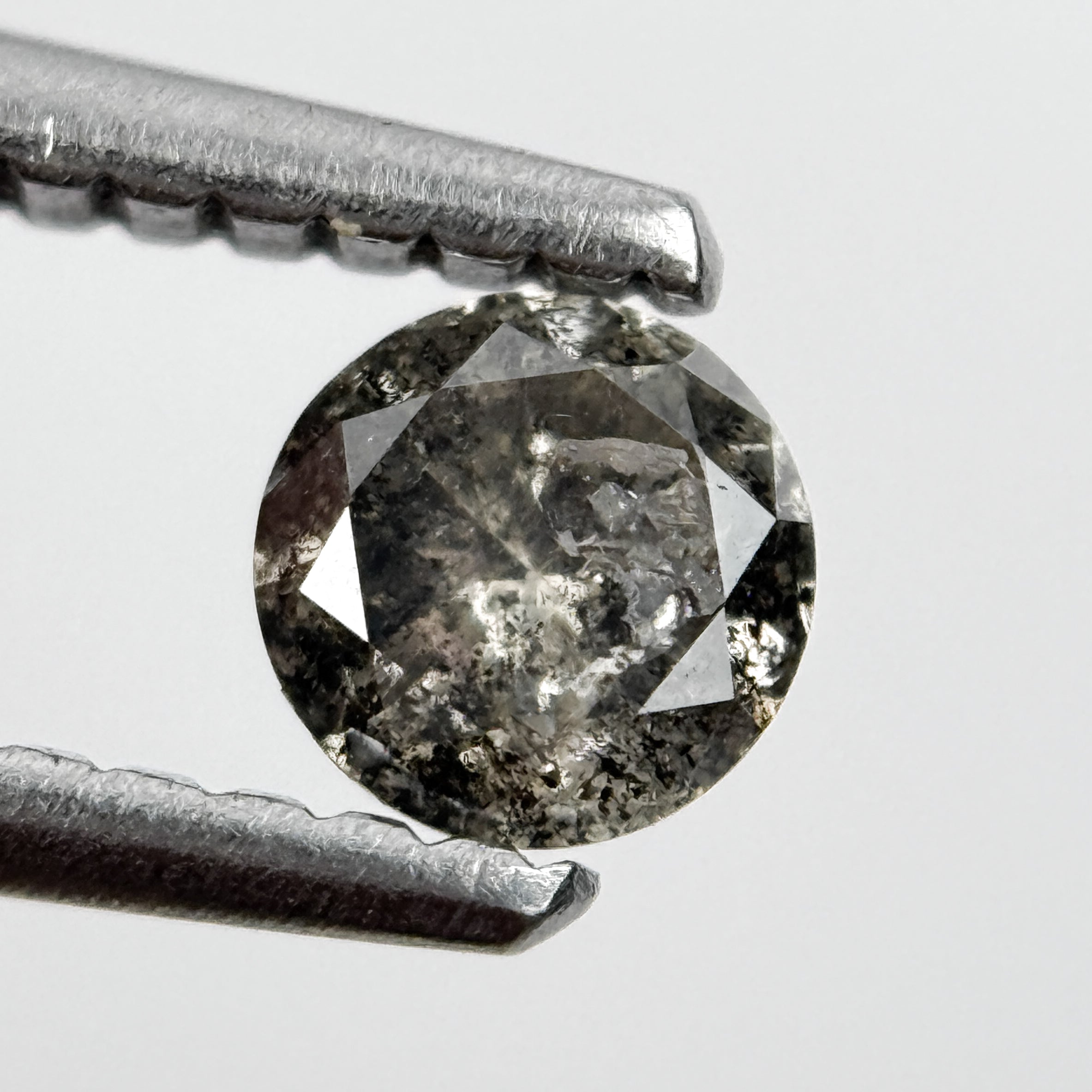 0.28 Ct Round Brilliant Cut Black Natural Salt and Pepper Diamond