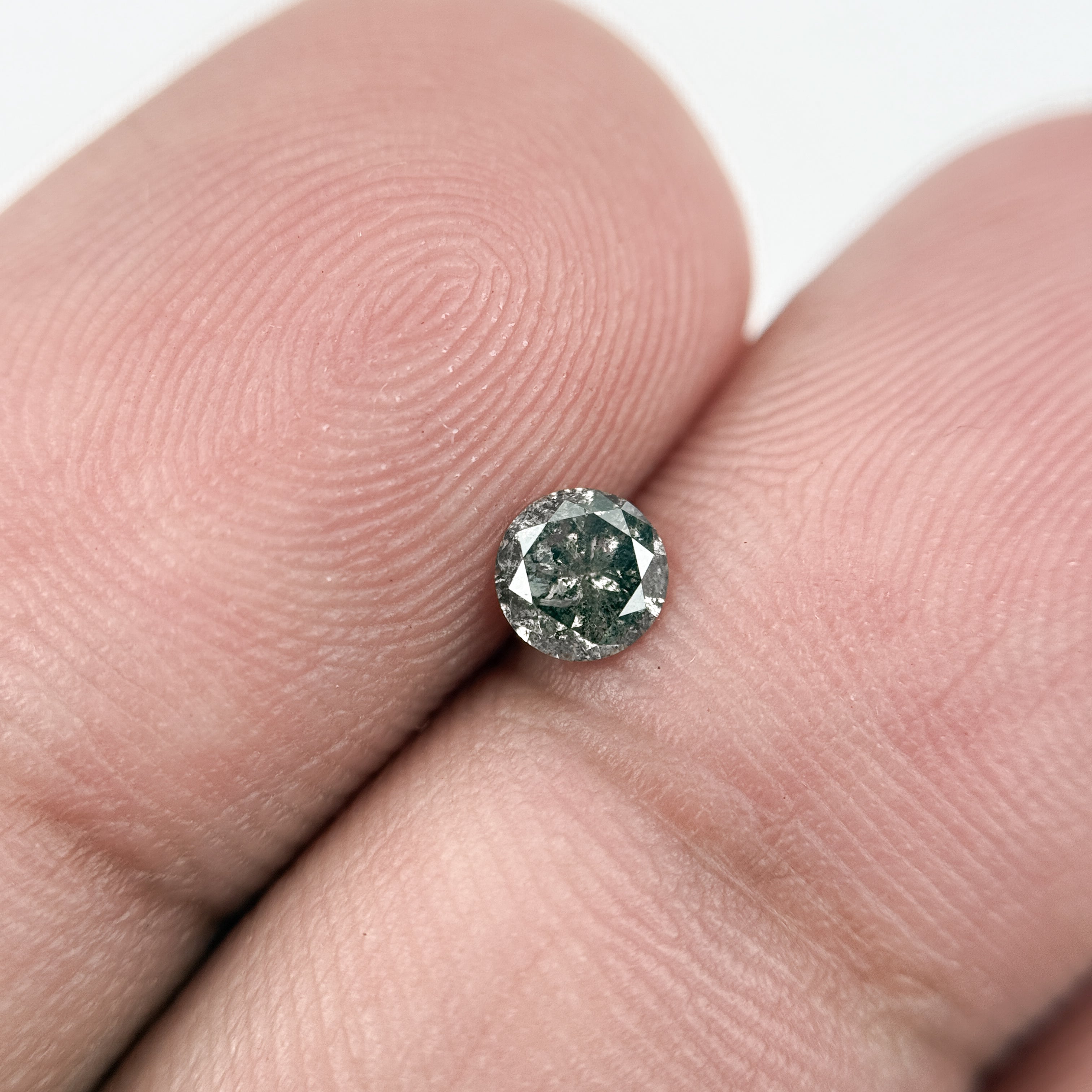 0.28 Ct Round Brilliant Cut Black Natural Salt and Pepper Diamond