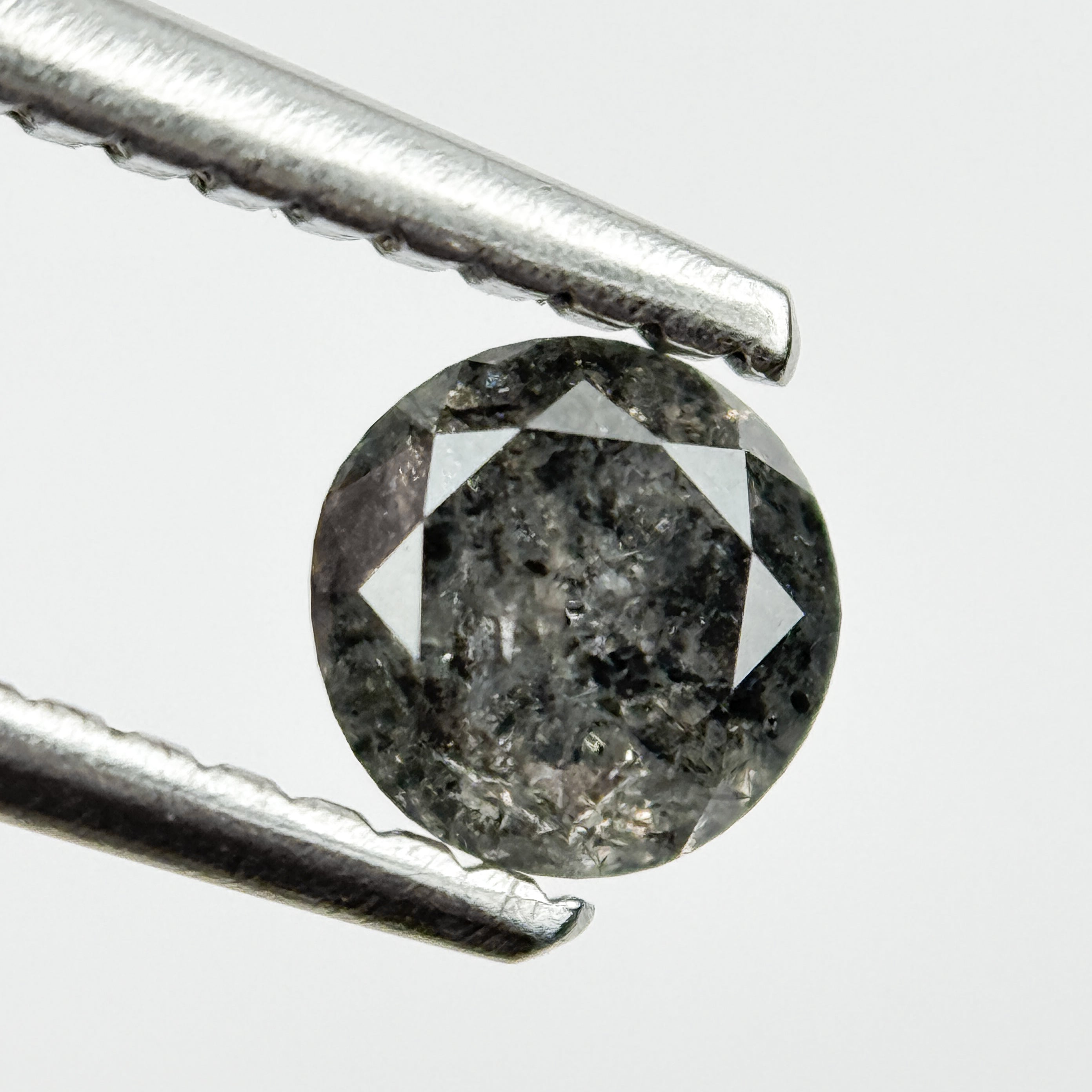 0.43 Ct Round Brilliant Cut Black Natural Salt and Pepper Diamond