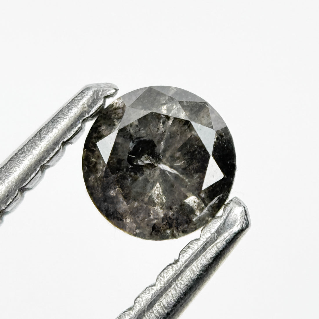 0.30 Ct Round Brilliant Cut Black Natural Salt and Pepper Diamond