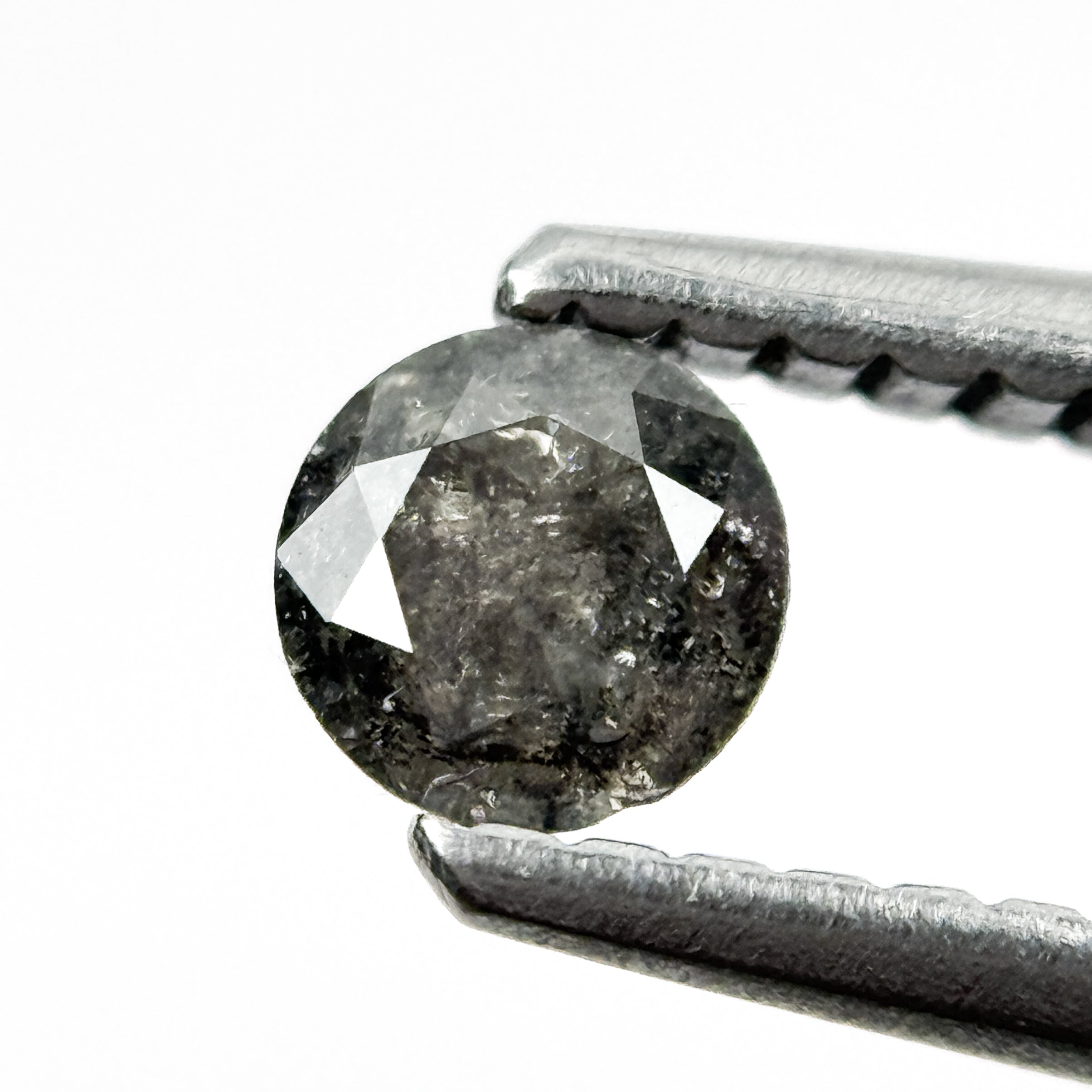 0.25 Ct Round Brilliant Cut Black Natural Salt and Pepper Diamond