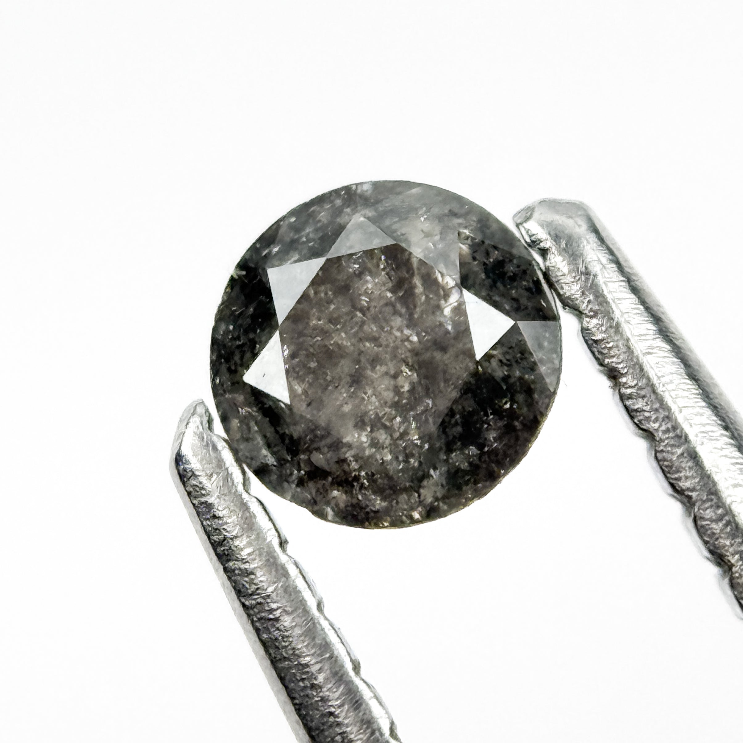 0.25 Ct Round Brilliant Cut Black Natural Salt and Pepper Diamond