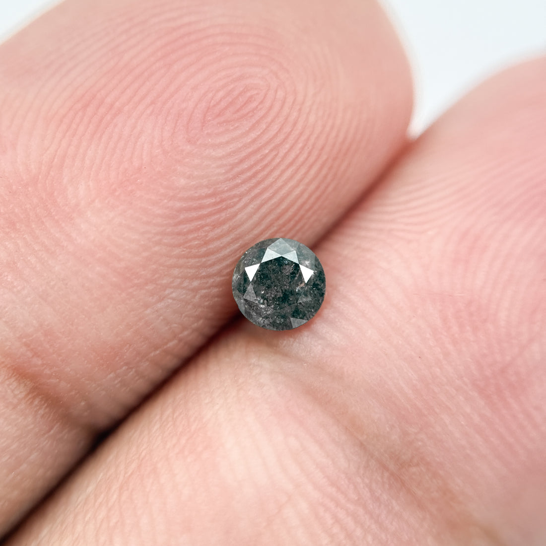 0.25 Ct Round Brilliant Cut Black Natural Salt and Pepper Diamond