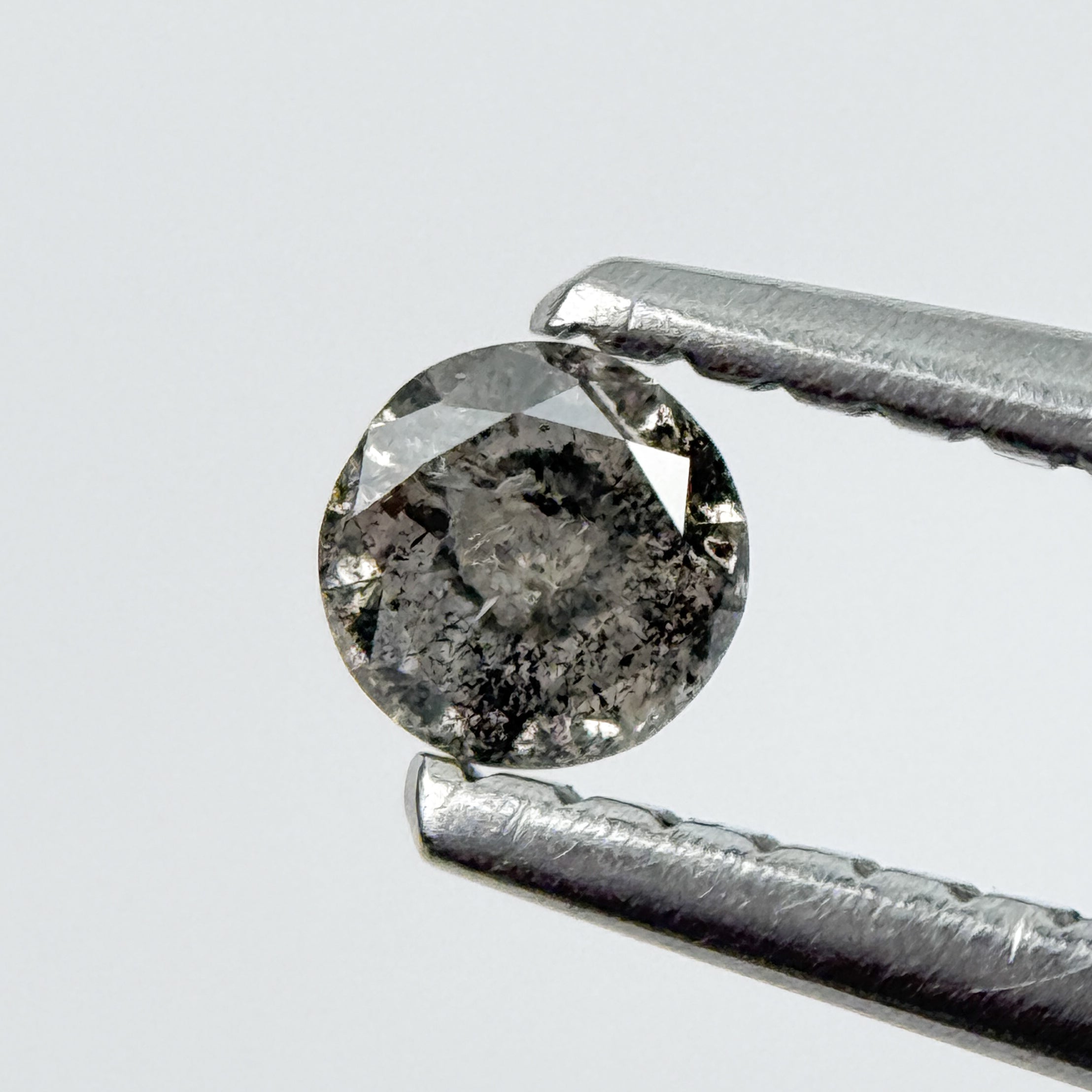 0.14 Ct Round Brilliant Cut Black Natural Salt and Pepper Diamond