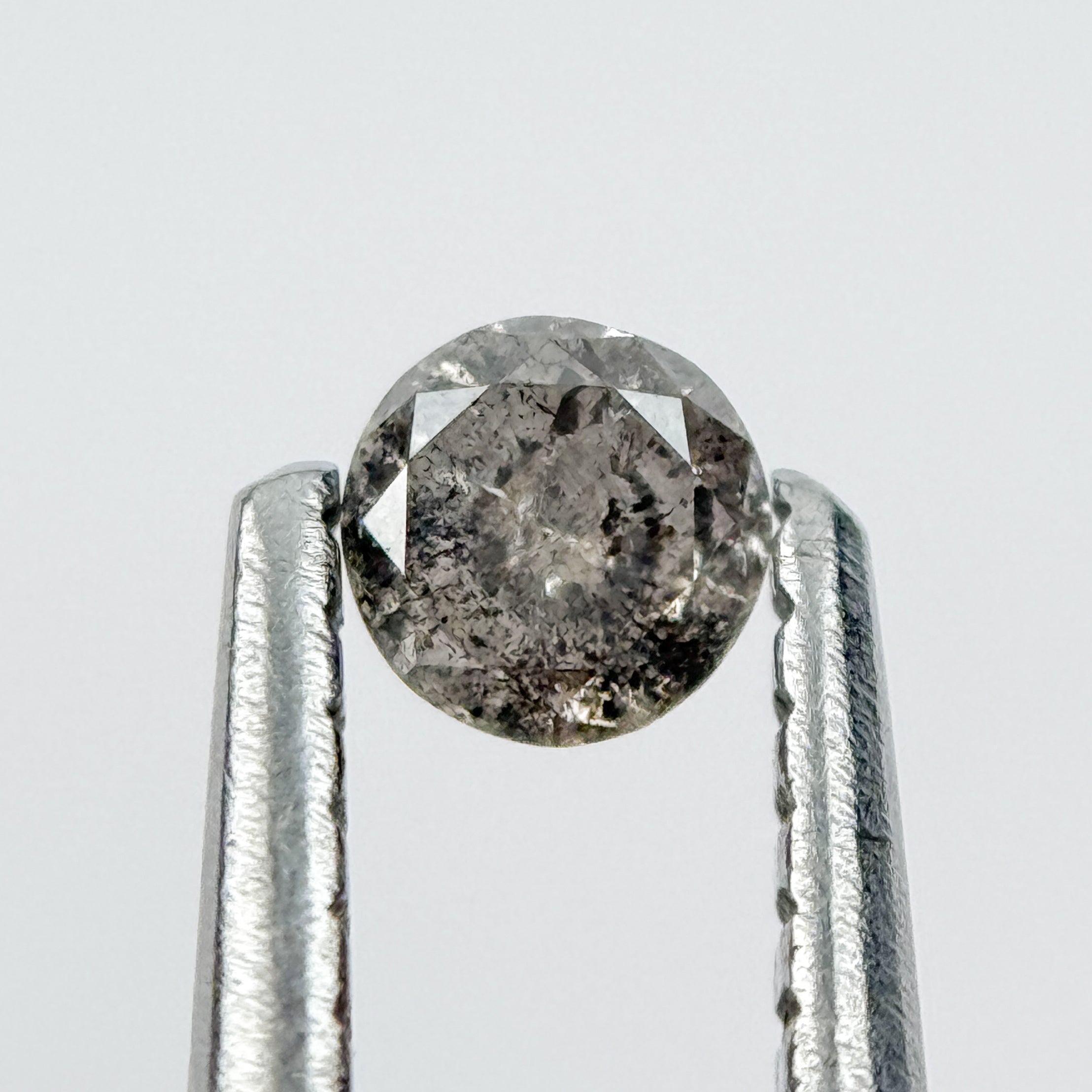 0.14 Ct Round Brilliant Cut Black Natural Salt and Pepper Diamond