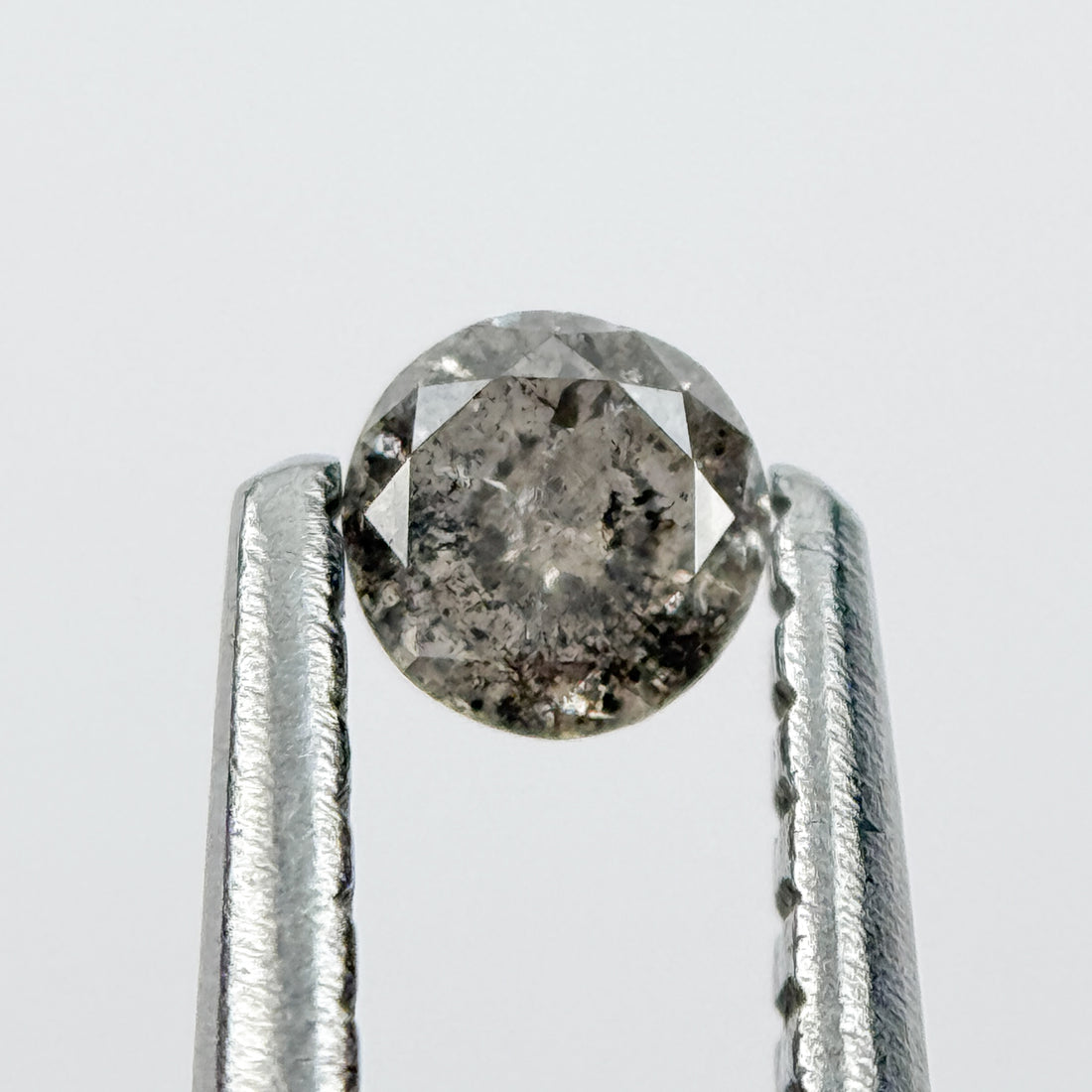0.14 Ct Round Brilliant Cut Black Natural Salt and Pepper Diamond