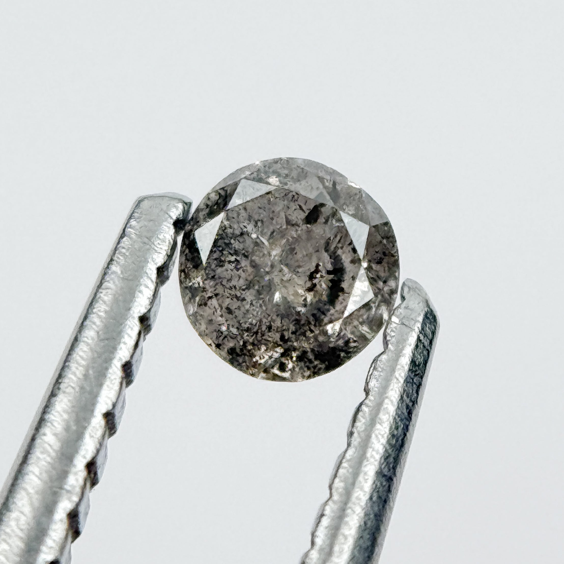 0.14 Ct Round Brilliant Cut Black Natural Salt and Pepper Diamond