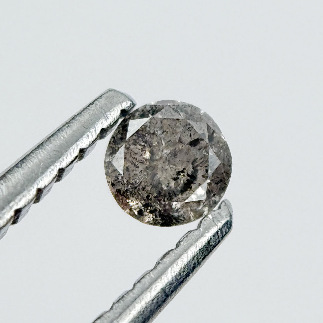 0.14 Ct Round Brilliant Cut Black Natural Salt and Pepper Diamond