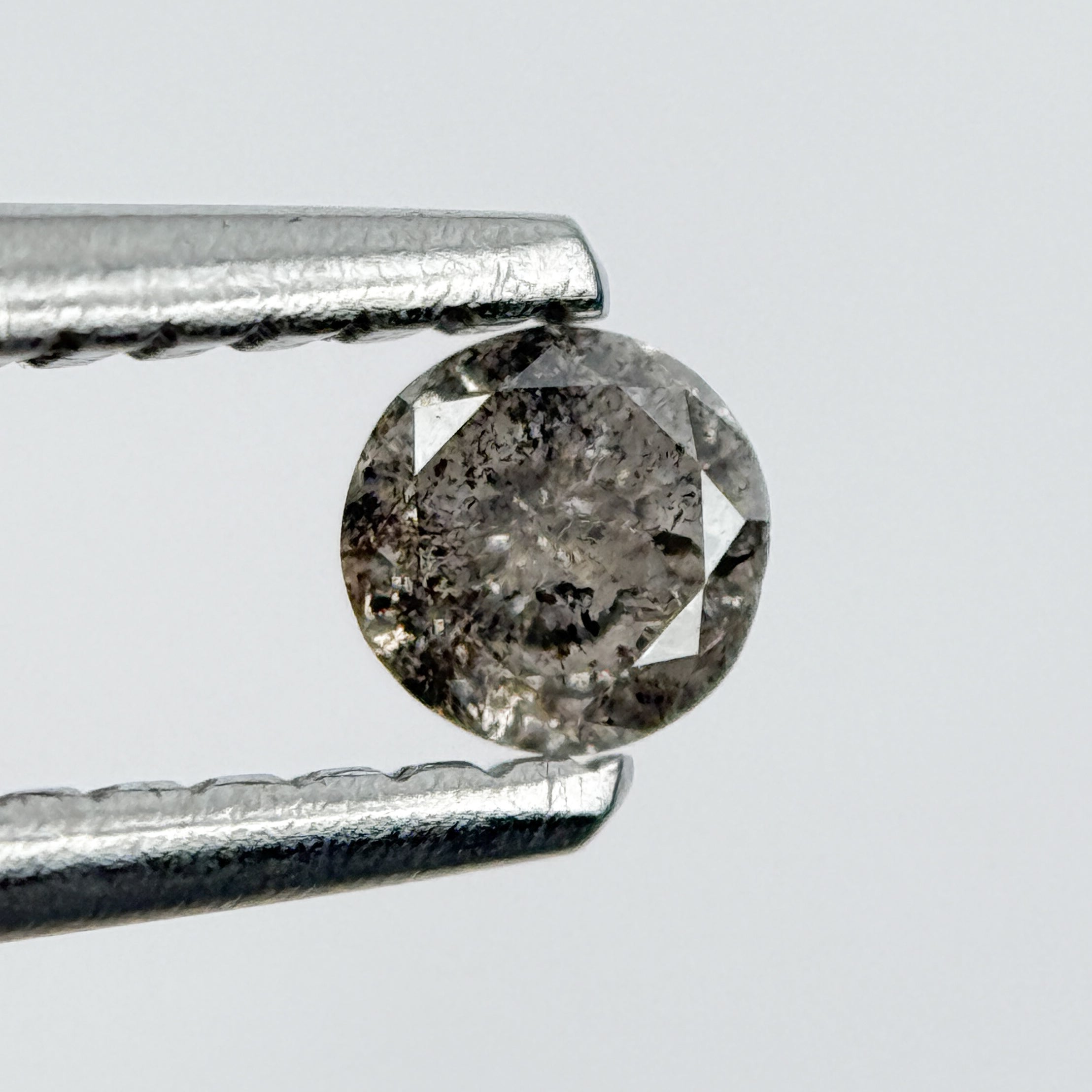 0.14 Ct Round Brilliant Cut Black Natural Salt and Pepper Diamond