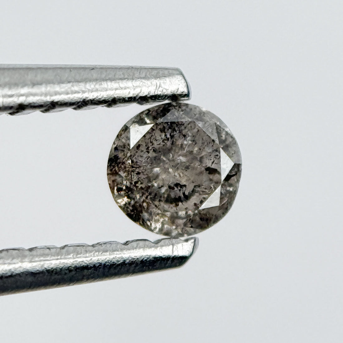 0.14 Ct Round Brilliant Cut Black Natural Salt and Pepper Diamond
