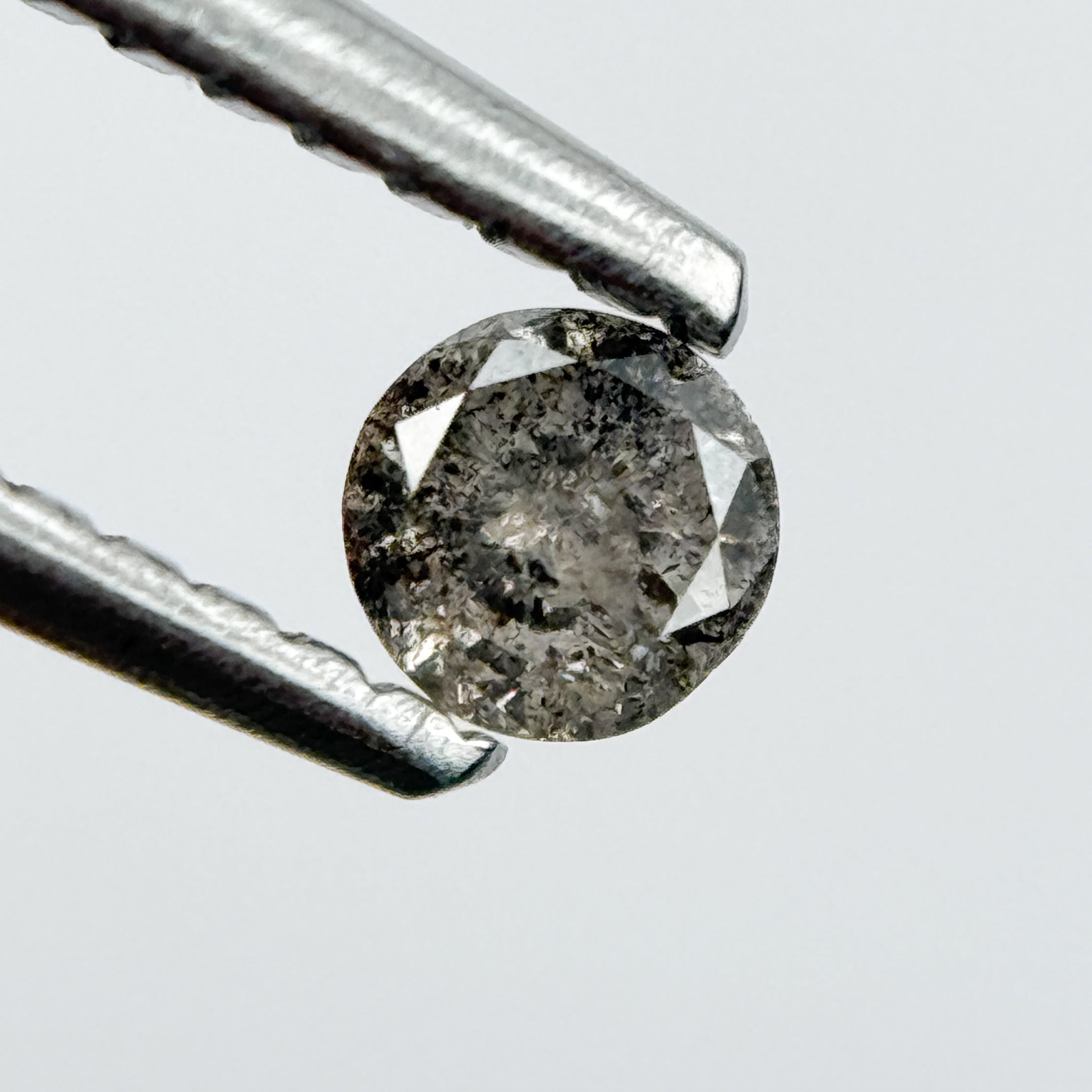 0.14 Ct Round Brilliant Cut Black Natural Salt and Pepper Diamond