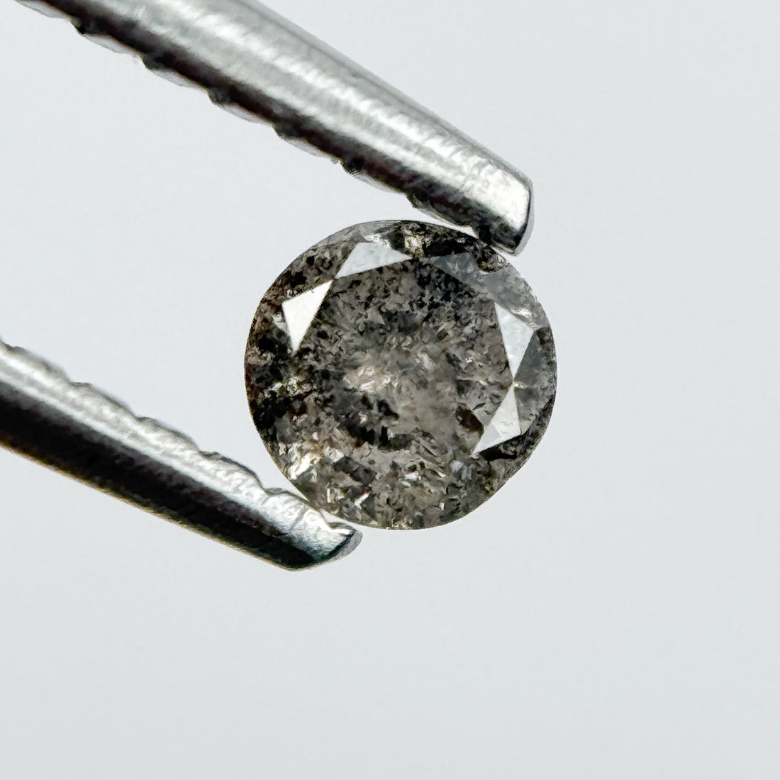 0.14 Ct Round Brilliant Cut Black Natural Salt and Pepper Diamond