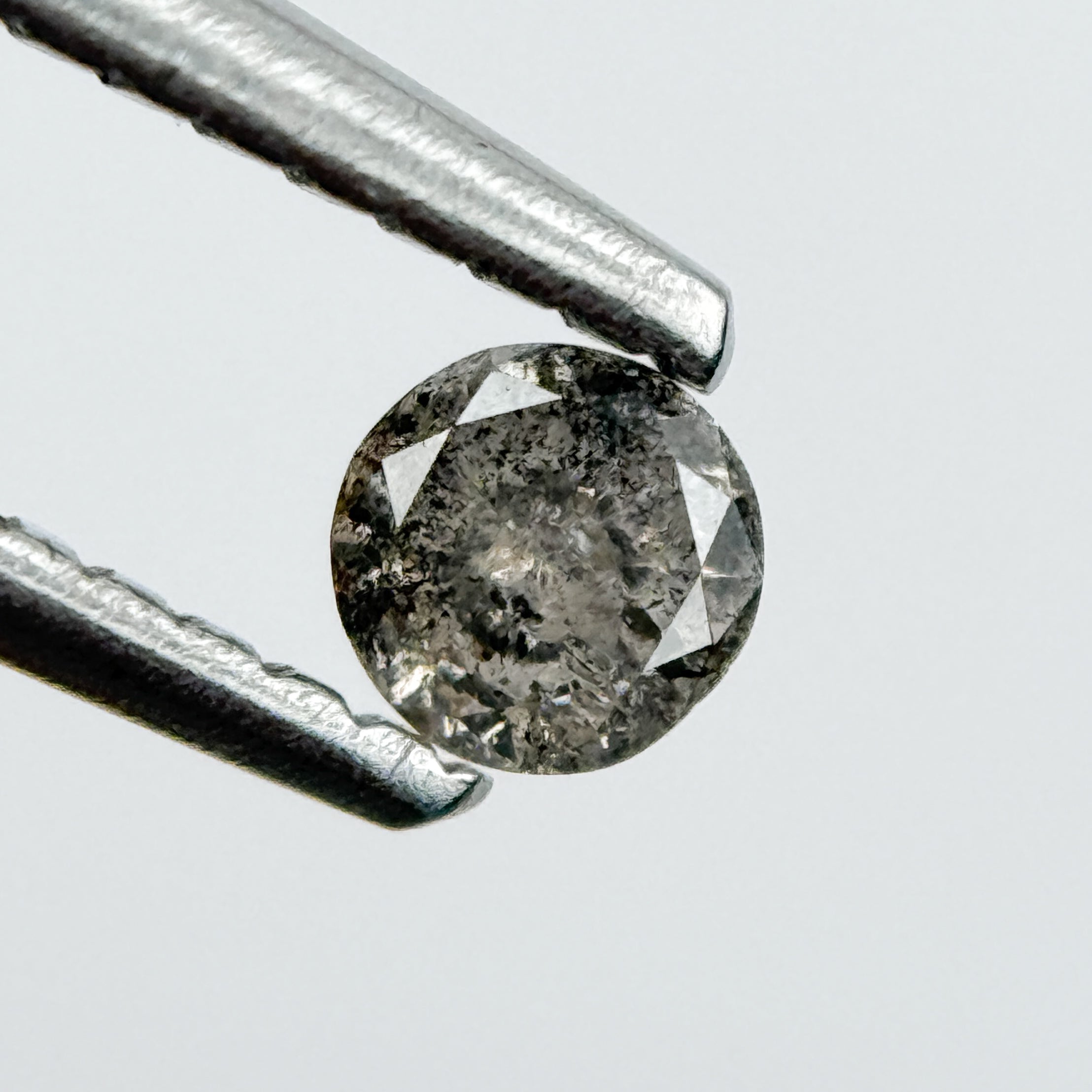 0.14 Ct Round Brilliant Cut Black Natural Salt and Pepper Diamond
