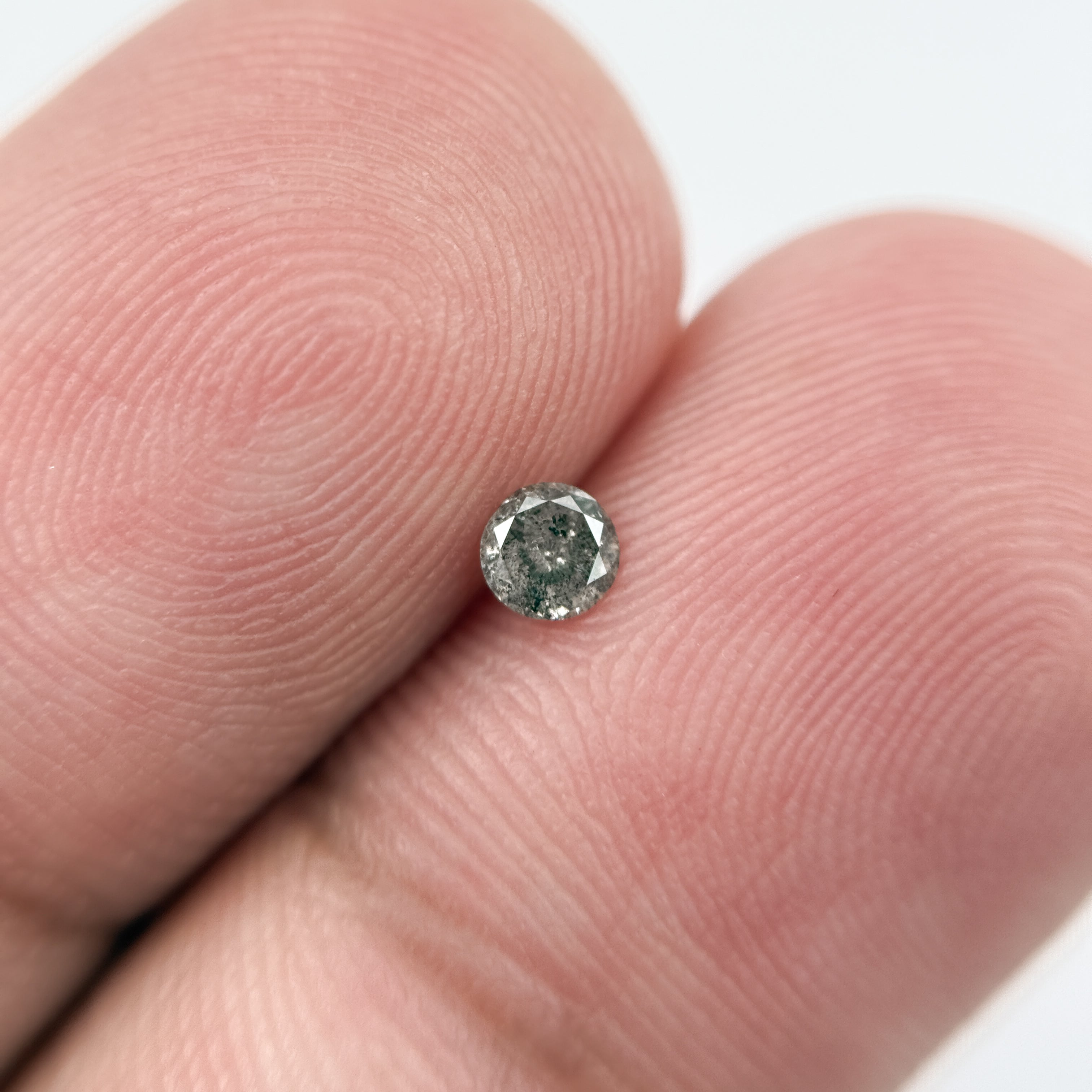 0.14 Ct Round Brilliant Cut Black Natural Salt and Pepper Diamond