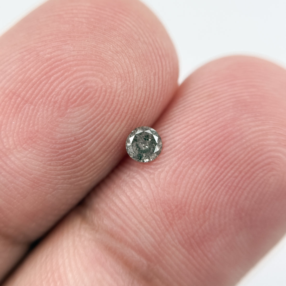 0.14 Ct Round Brilliant Cut Black Natural Salt and Pepper Diamond