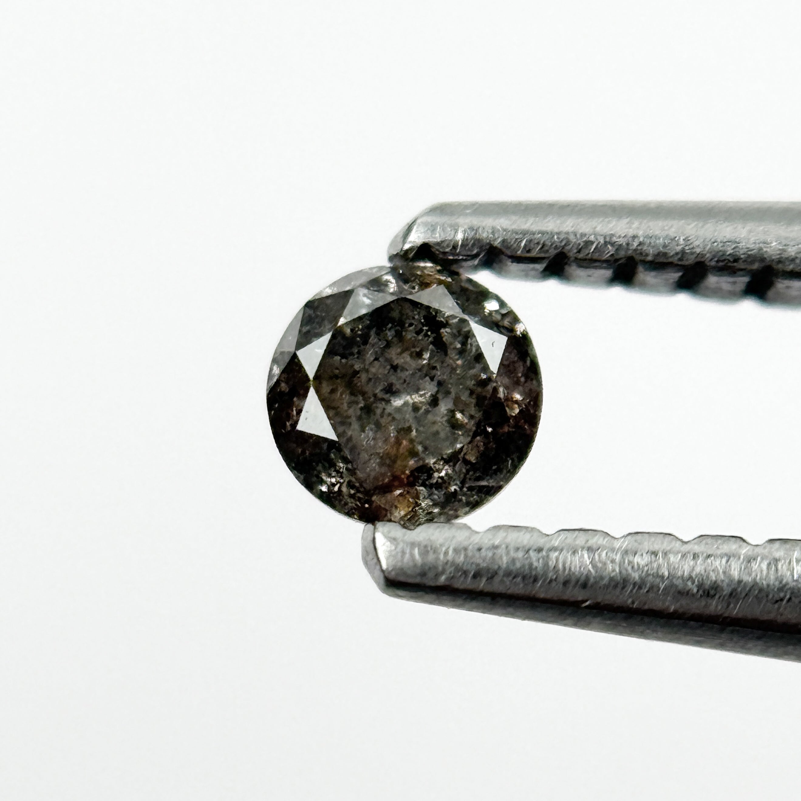 0.15 Ct Round Brilliant Cut Black Natural Salt and Pepper Diamond