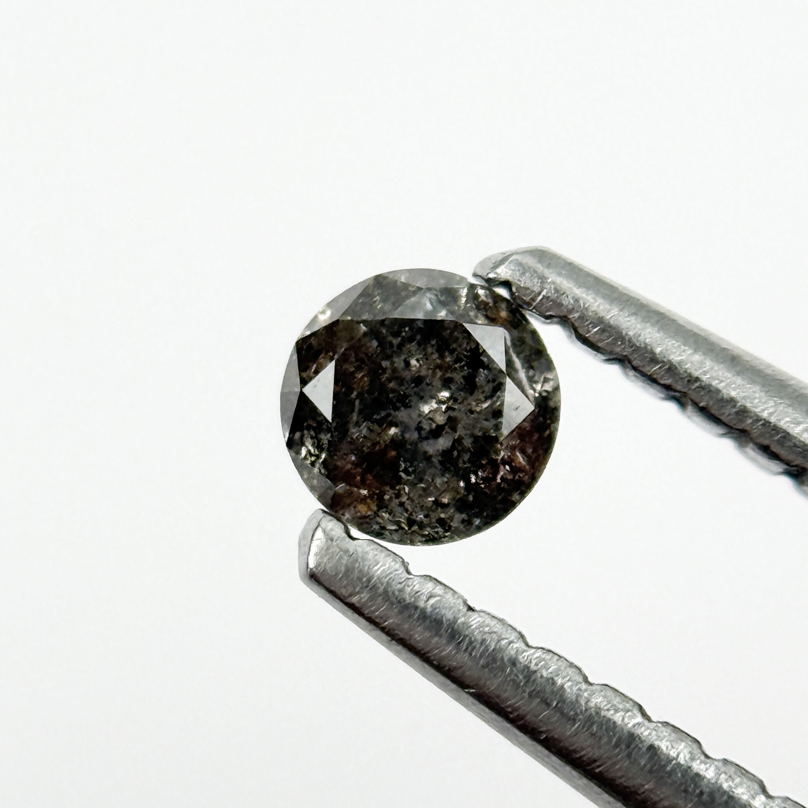 0.15 Ct Round Brilliant Cut Black Natural Salt and Pepper Diamond