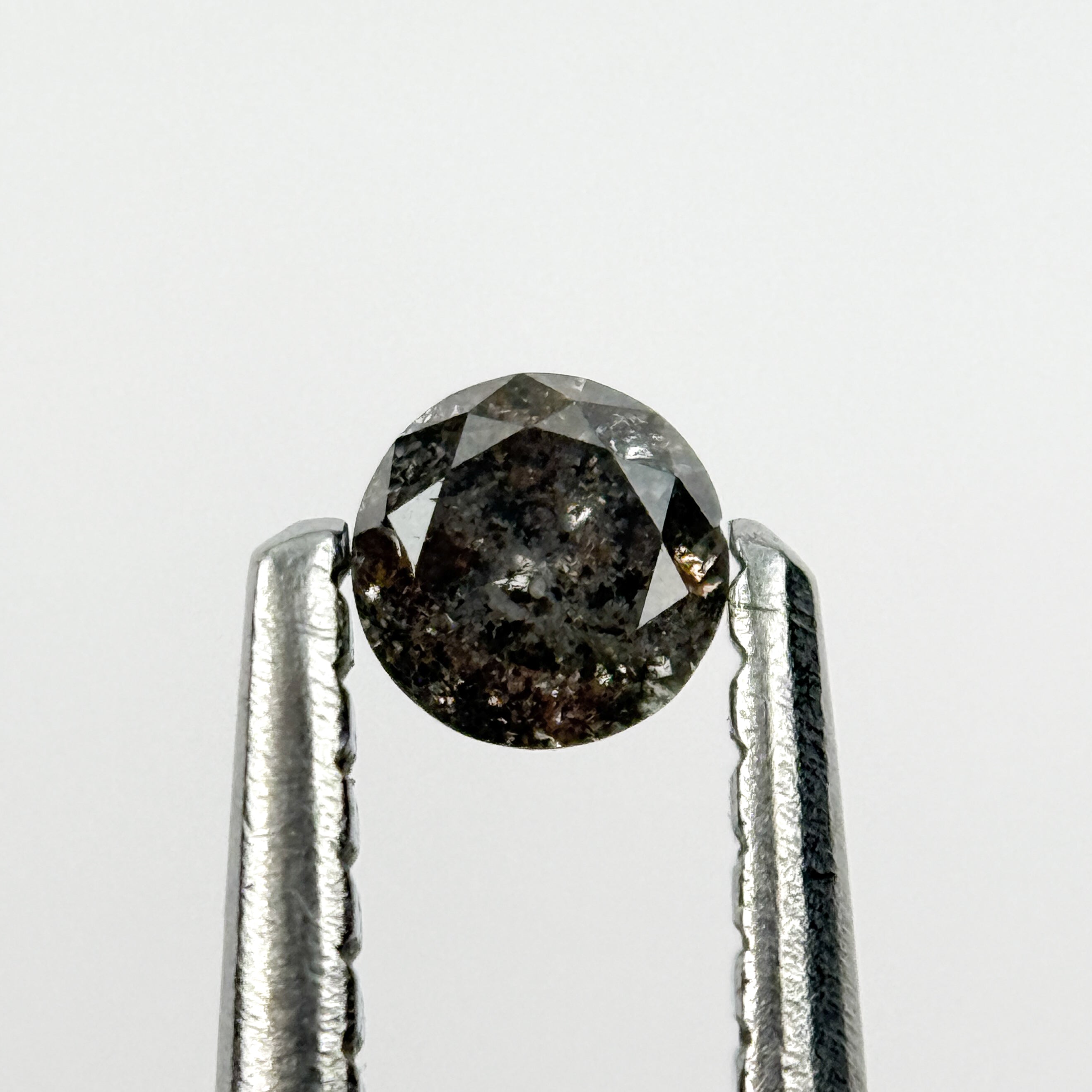 0.15 Ct Round Brilliant Cut Black Natural Salt and Pepper Diamond