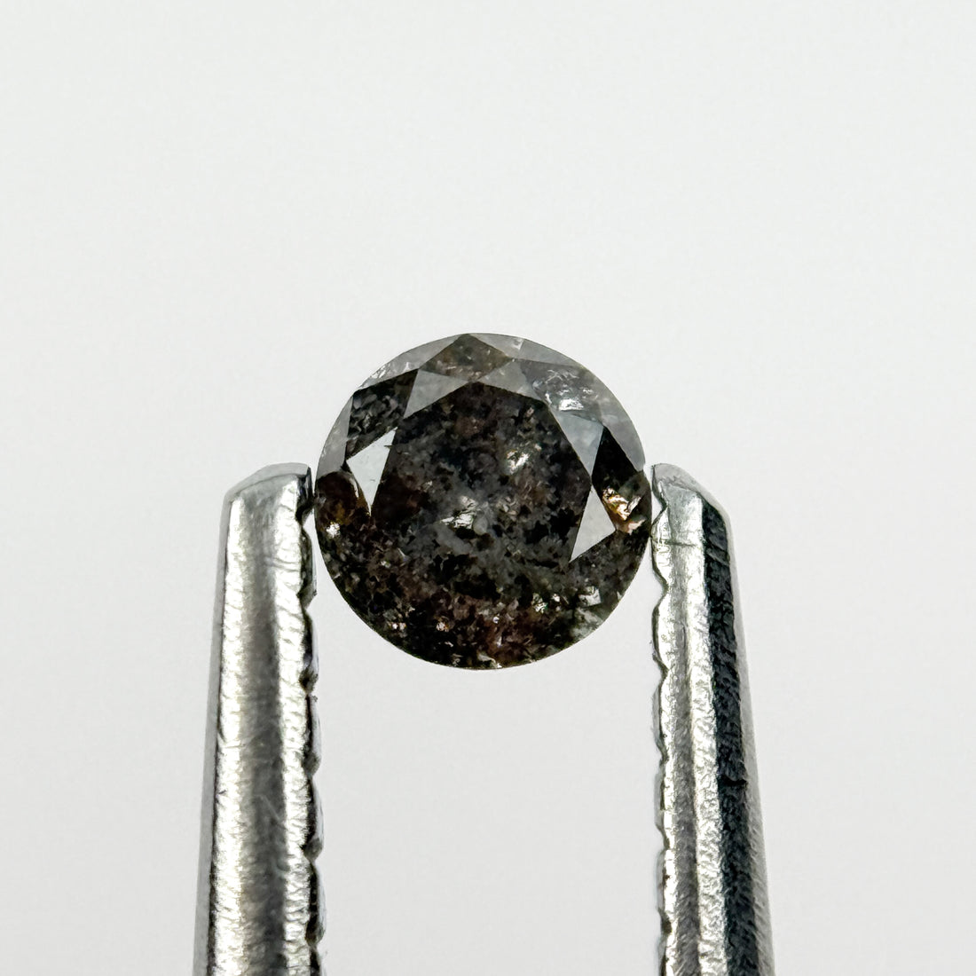 0.15 Ct Round Brilliant Cut Black Natural Salt and Pepper Diamond