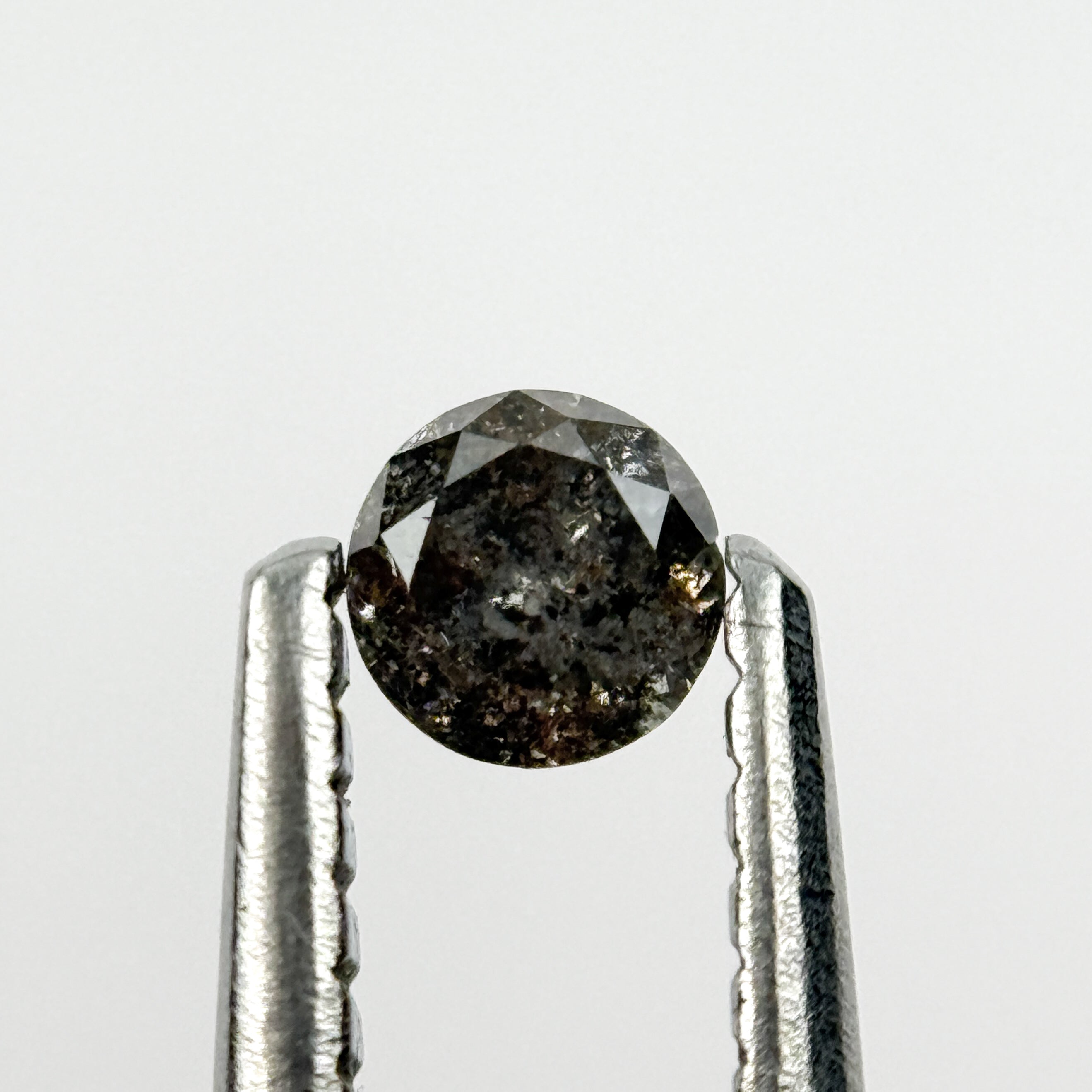 0.15 Ct Round Brilliant Cut Black Natural Salt and Pepper Diamond