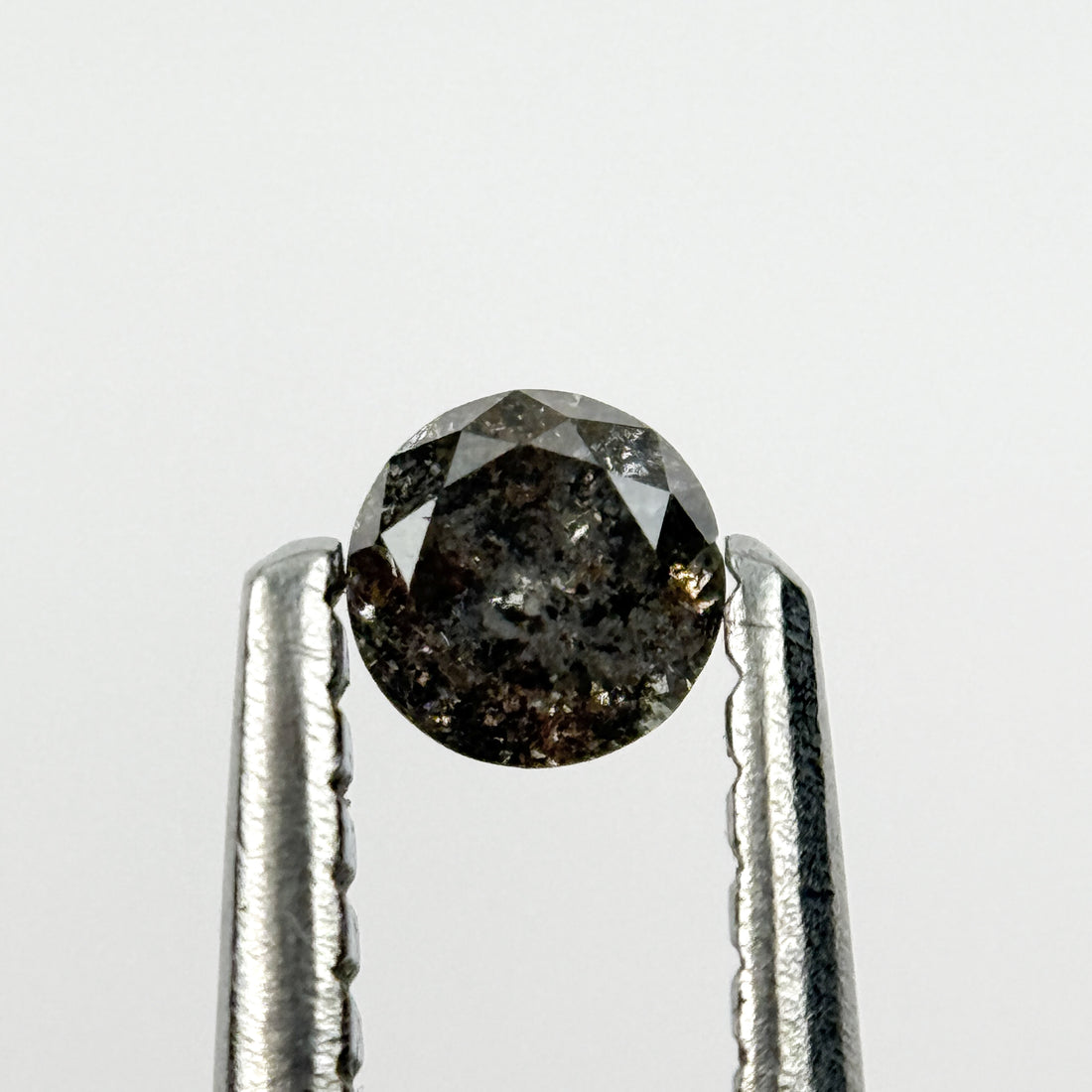 0.15 Ct Round Brilliant Cut Black Natural Salt and Pepper Diamond