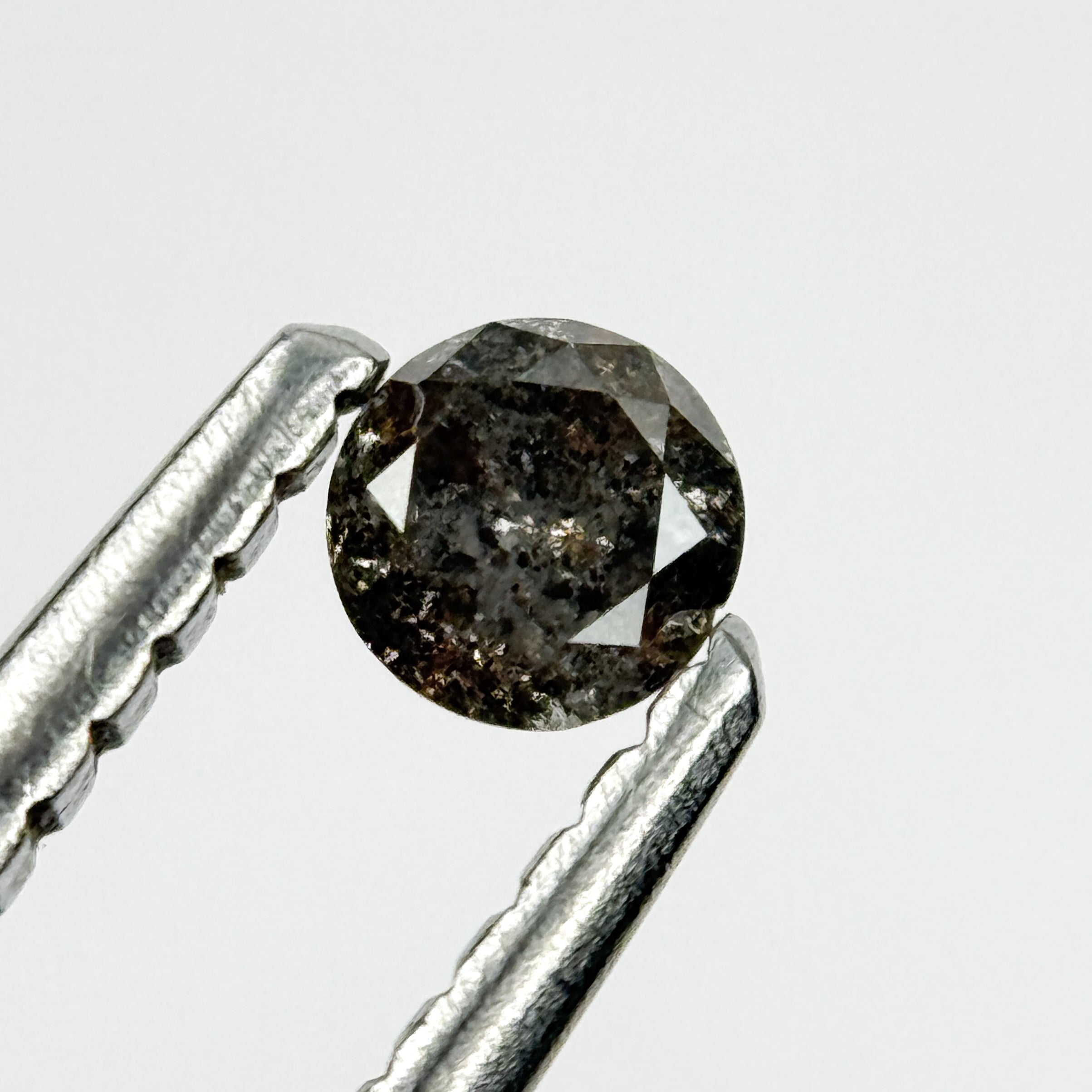 0.15 Ct Round Brilliant Cut Black Natural Salt and Pepper Diamond
