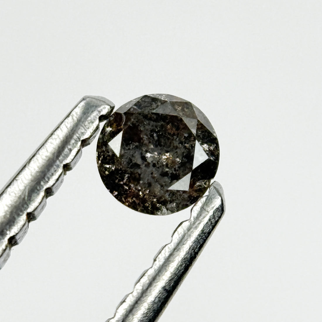 0.15 Ct Round Brilliant Cut Black Natural Salt and Pepper Diamond