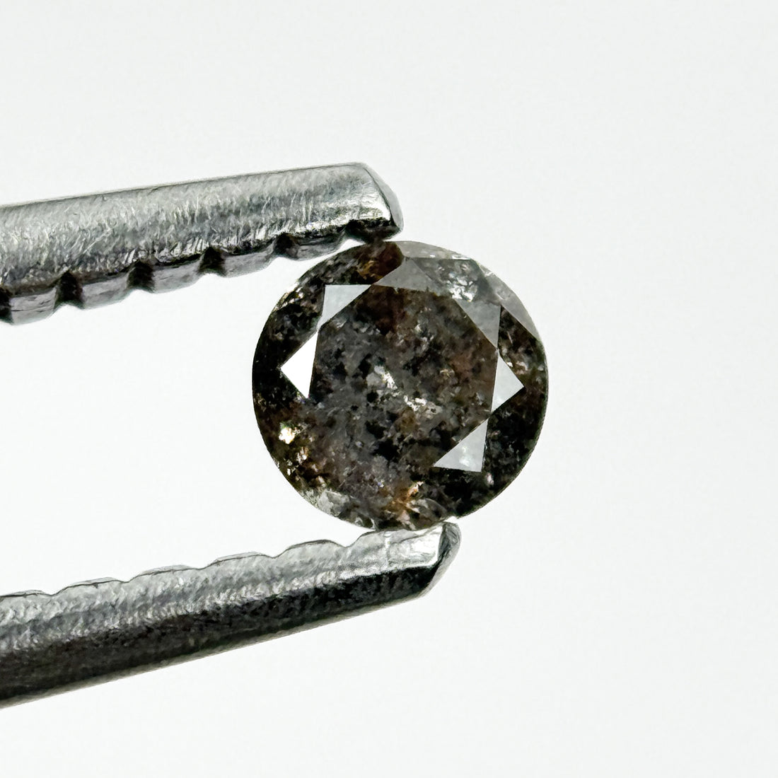 0.15 Ct Round Brilliant Cut Black Natural Salt and Pepper Diamond
