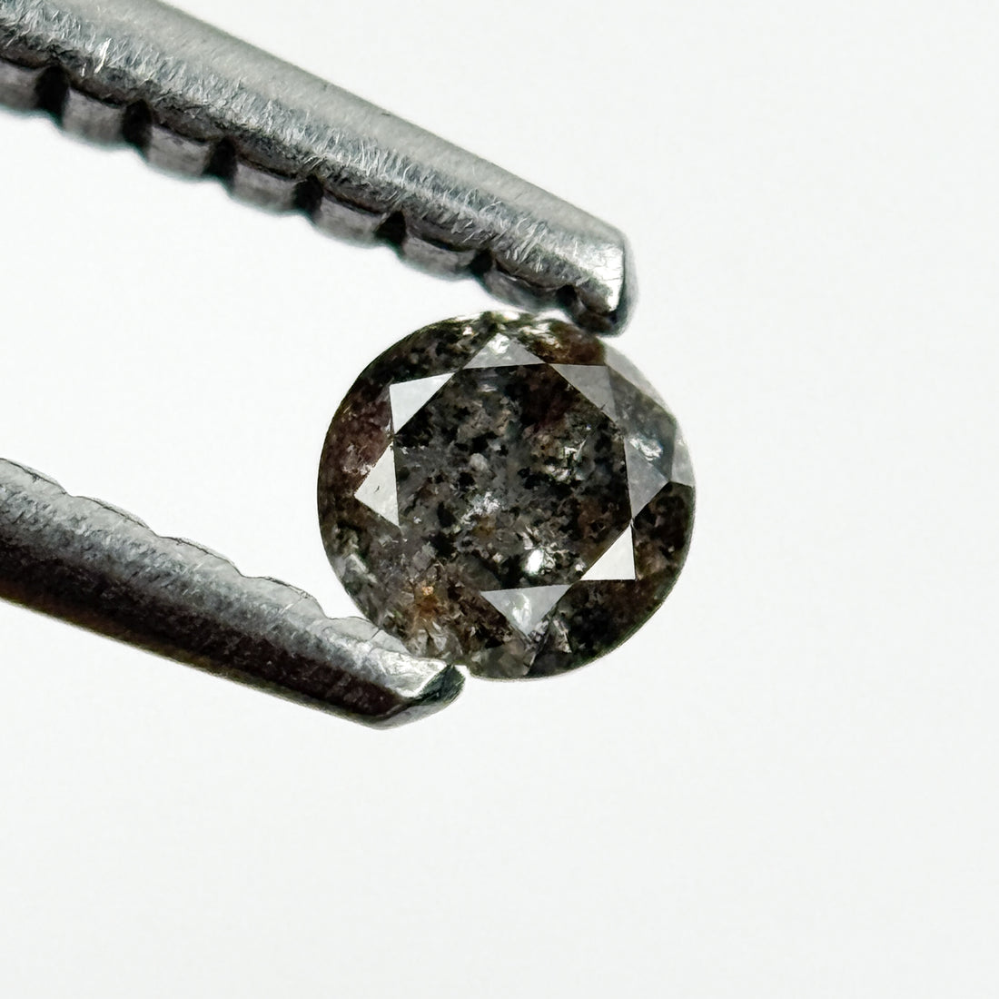 0.15 Ct Round Brilliant Cut Black Natural Salt and Pepper Diamond