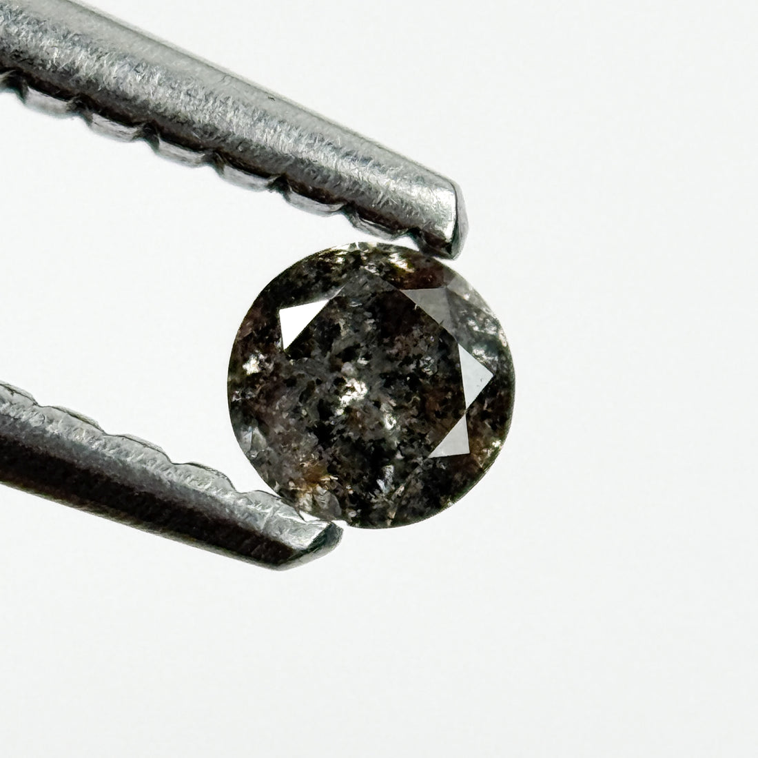 0.15 Ct Round Brilliant Cut Black Natural Salt and Pepper Diamond
